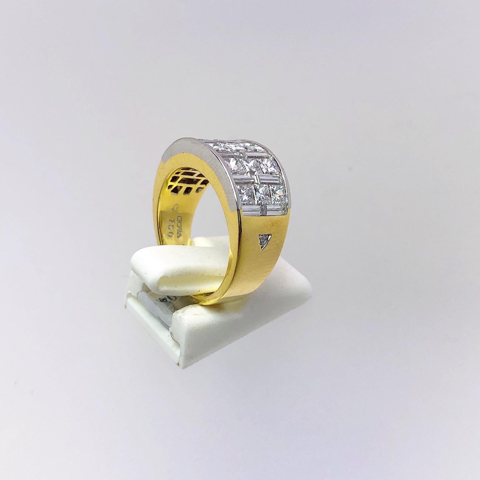 Designed by Nova Jewelry this 18 karat yellow gold band ring is set with an alternating pattern of princess cut and baguette cut diamonds. The two different diamond cuts , set in platinum,are very brilliant when set side by side. 
Total Diamond