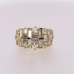 Nova 18 Karat Yellow Gold Ring with 3.48 Carat Round and Baguette Diamonds