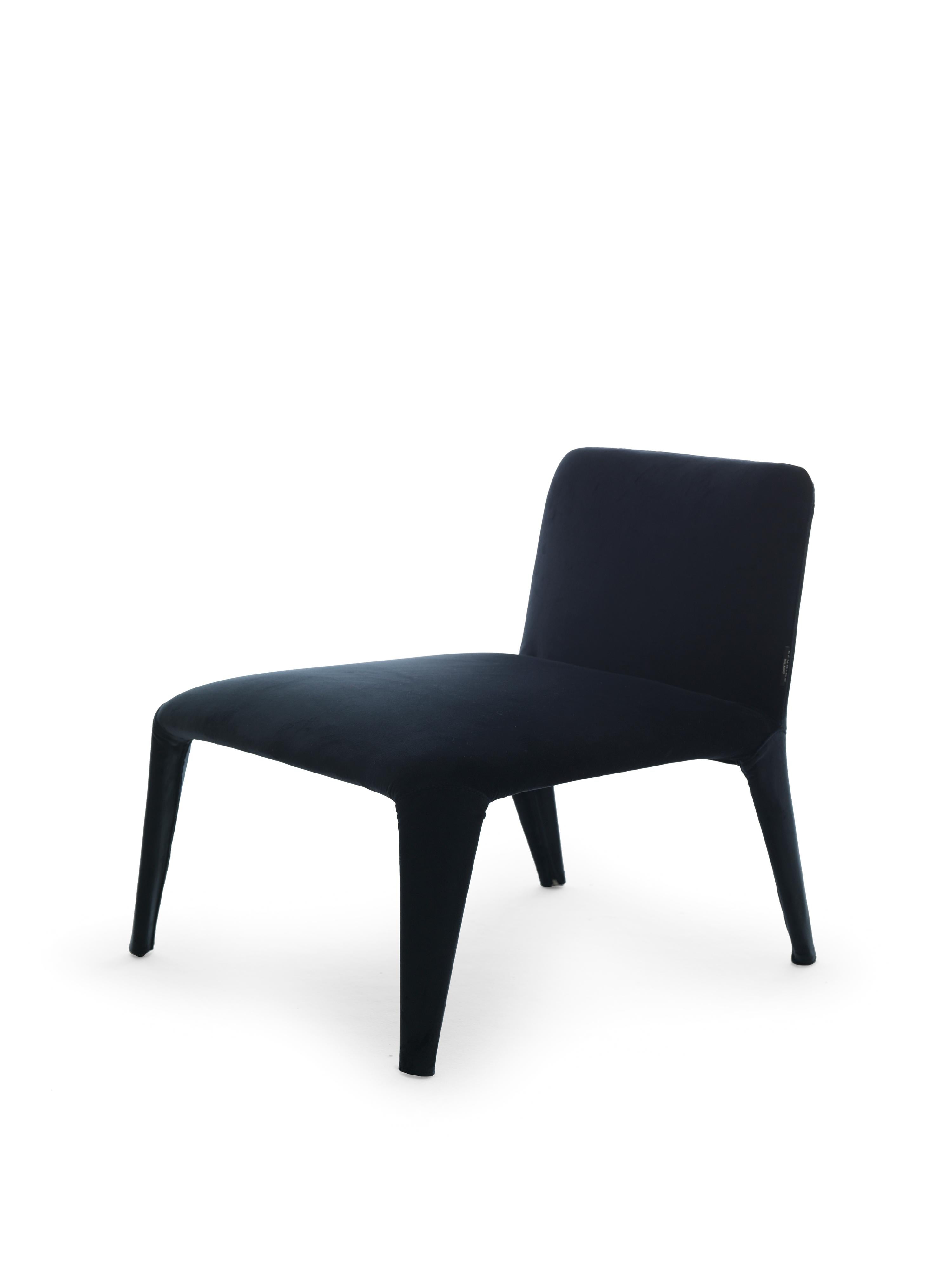 Nova is a light-weight textile armchair with a precious look and a fully removable fabric cover. The internal structure is a minimal metal tube skeleton that supports the elastic straps and the polyurethane cushions and that determines the form of