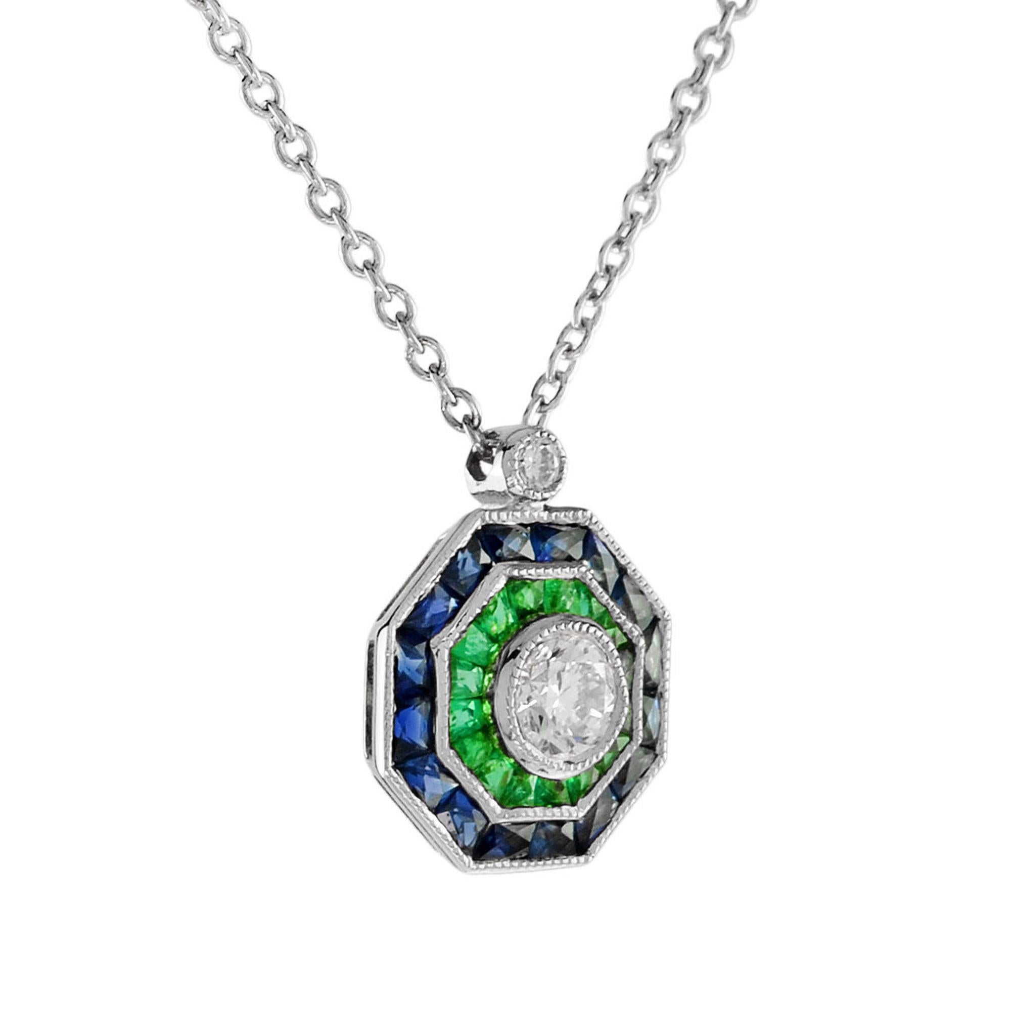 A glamorous Art Deco inspired target cluster pendant necklace bezel set with stunning a brilliant cut diamond, framed in an octagonal border of French cut emeralds and further sapphires which case around the edge. 

Information
Style: Art