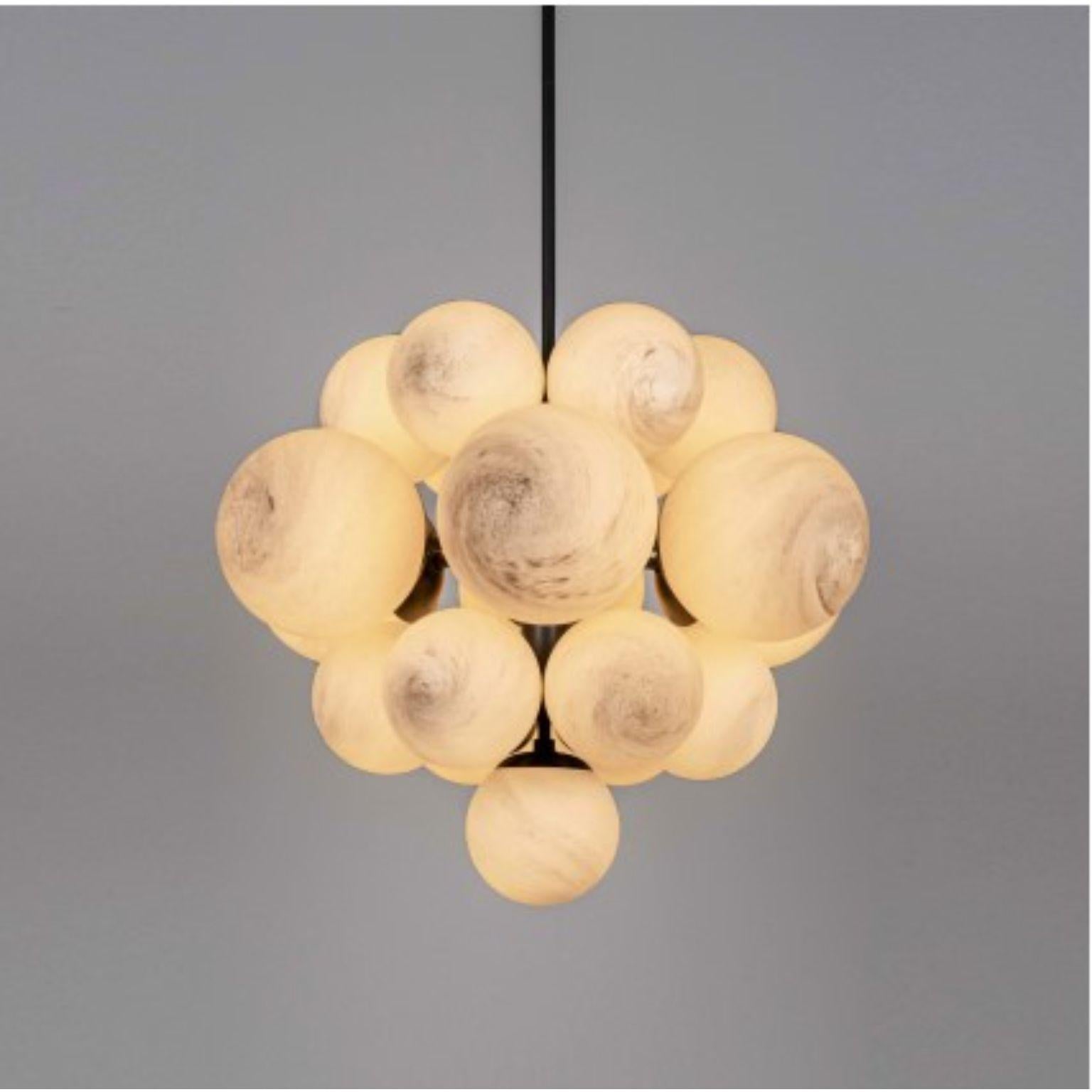 Nova chandelier by Schwung
Dimensions: D68.8 x H 153 cm
Materials: brass, opal glass
Weight: 19.4 kg

Finishes available: black gunmetal, polished nickel, brass
Other sizes available.

 Schwung is a german word, and loosely defined, means