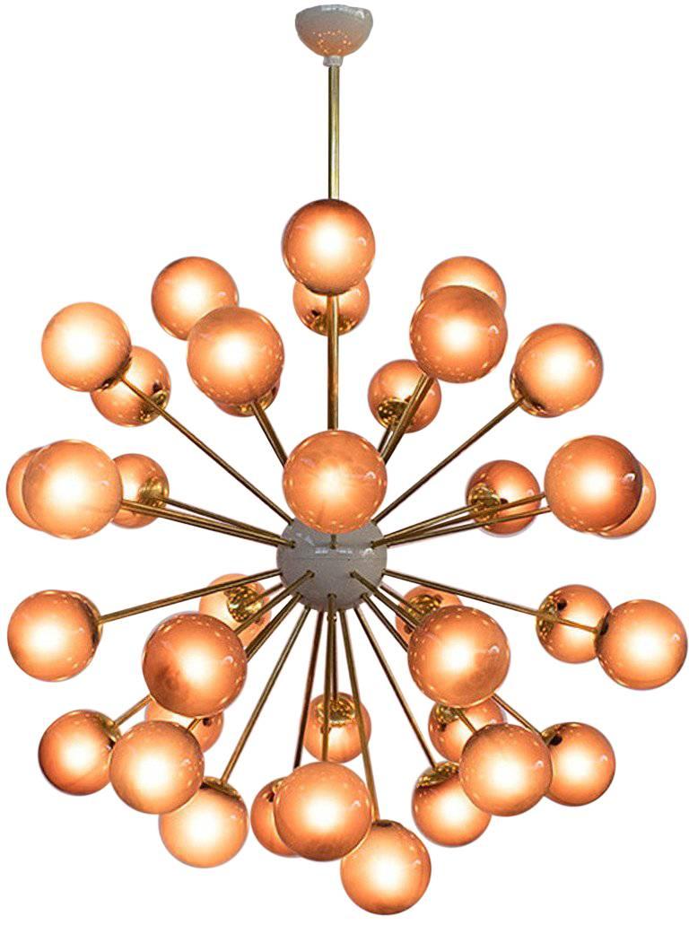 Italian sputnik chandelier with 40 Murano glass globes mounted on brass frame / Designed by Fabio Bergomi for Fabio Ltd / Made in Italy
40 lights / E12 or E14 type / max 40W each
Measures: diameter 49 inches / height 59 inches including rod and