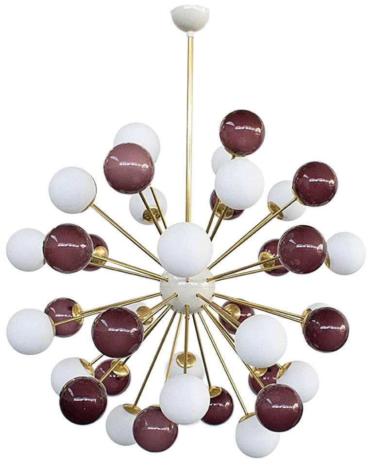 Italian sputnik chandelier with 40 Murano glass globes mounted on brass frame / Designed by Fabio Bergomi for Fabio Ltd / Made in Italy
40 lights / E12 or E14 type / max 40W each
Measures: diameter 49 inches / height 59 inches including rod and