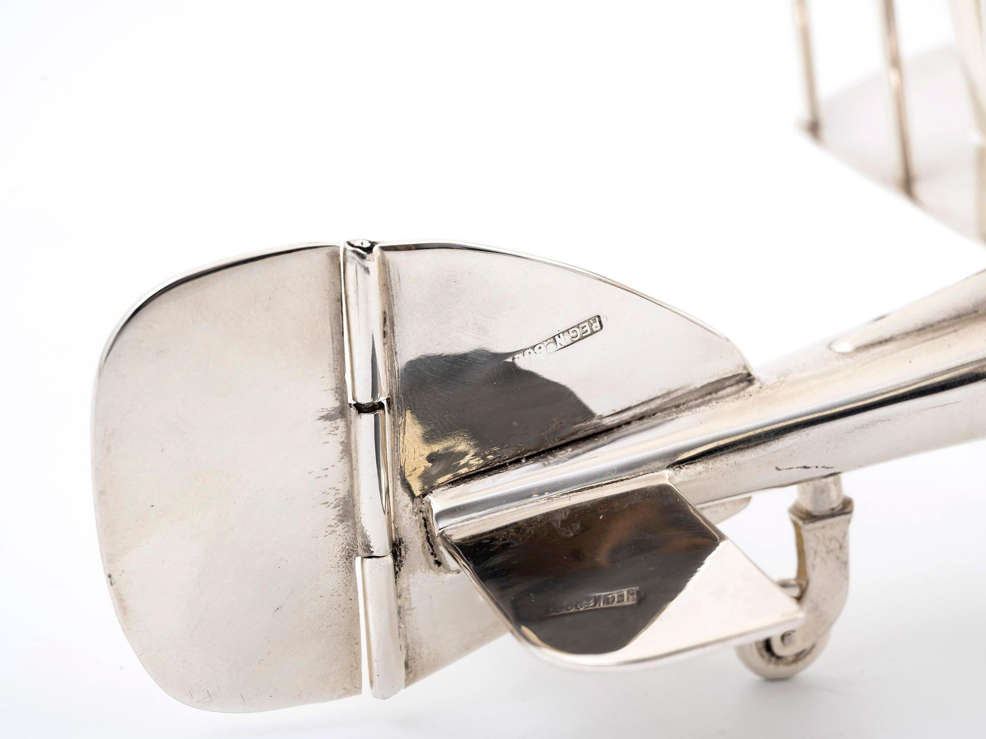 Metal Novelty Art Deco Silver Plate Biplane Figure Posy Vase / Cigar Holder For Sale