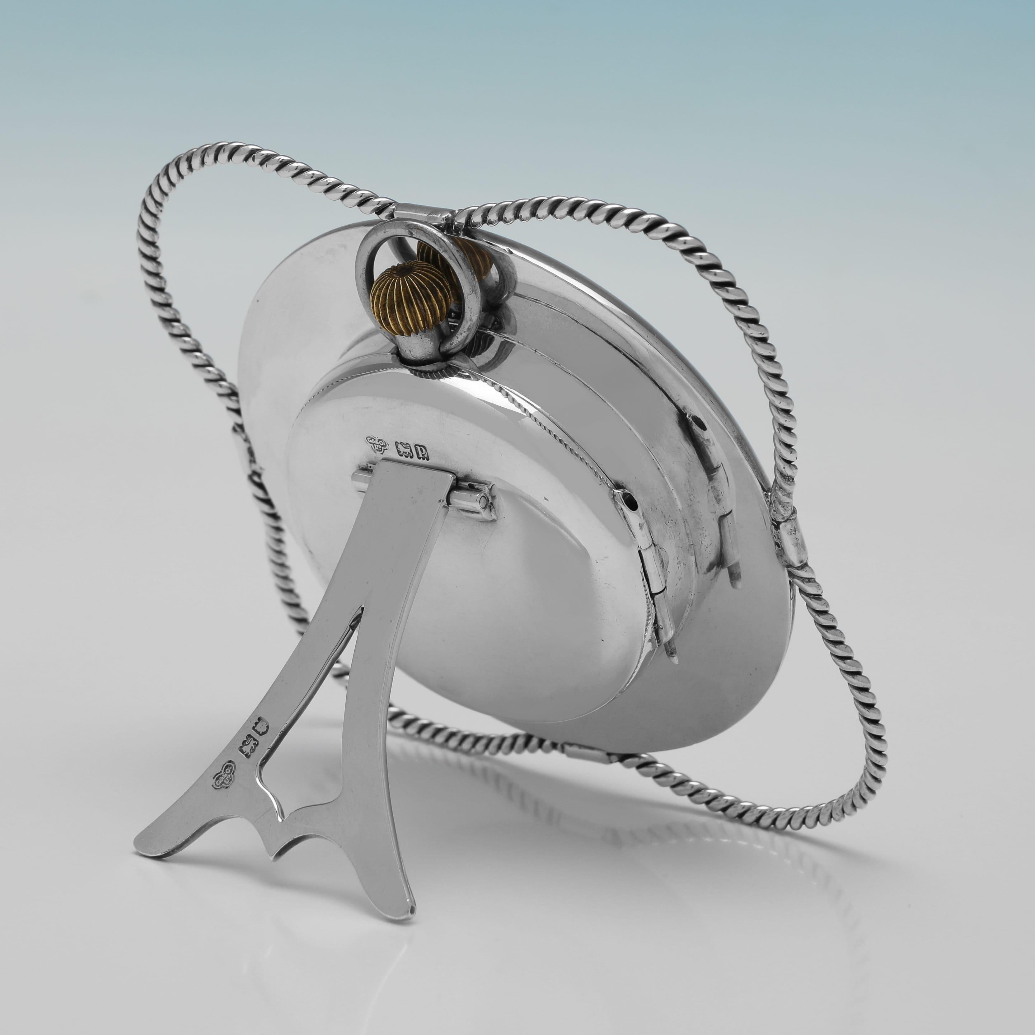 Hallmarked in London in 1910 by Goldsmiths & Silversmiths Co., this charming, novelty, Antique Sterling Silver Pocket Watch Stand, is modelled as a life buoy. 
The pocket watch stand measures 4
