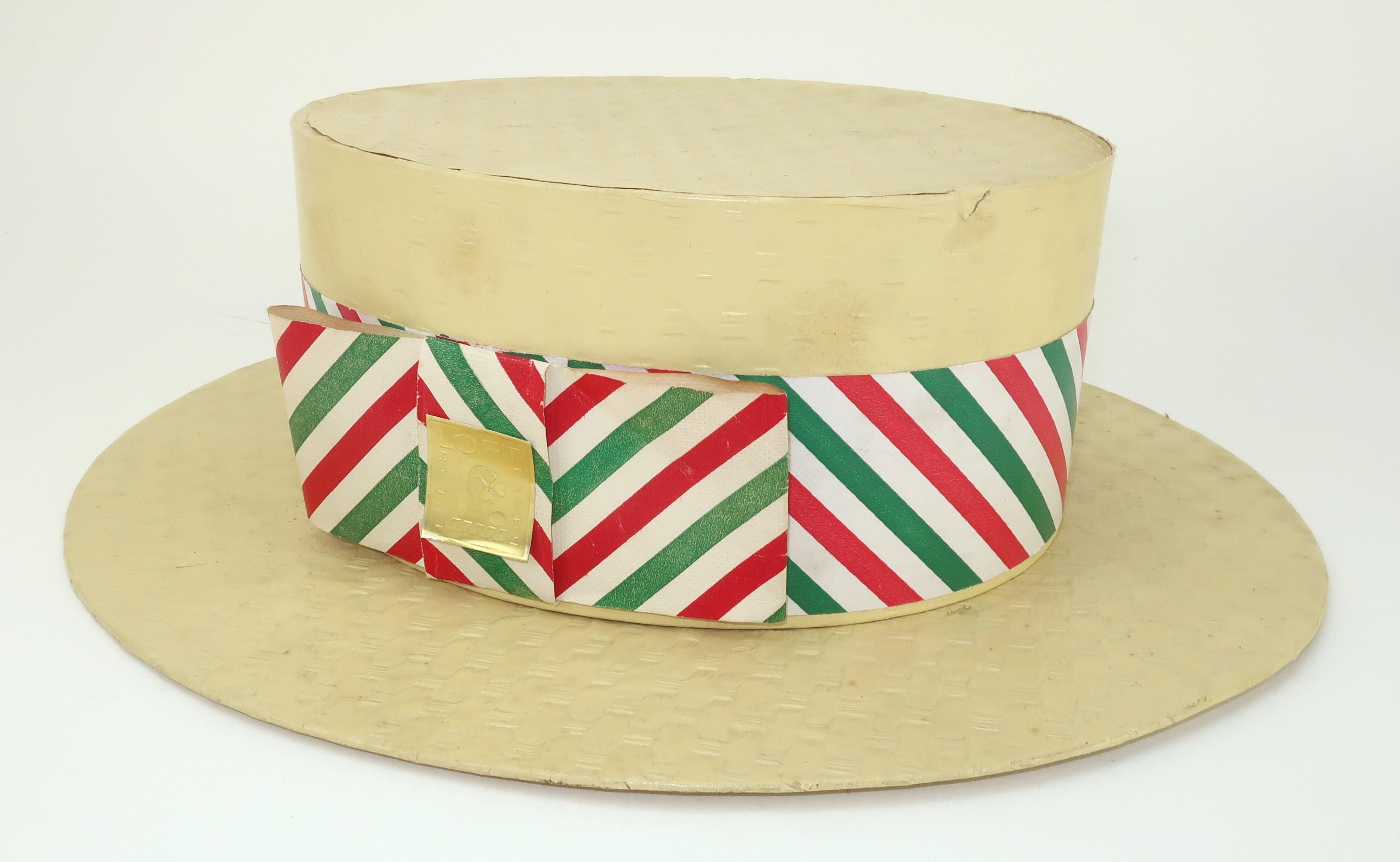 Once upon a time, this charming boater style hat had a sweet secret ... it was a novelty candy container box produced by Loft's Candies of New York. Loft's was founded in 1860 and by the 1920's was the world's largest candy seller in the world. The
