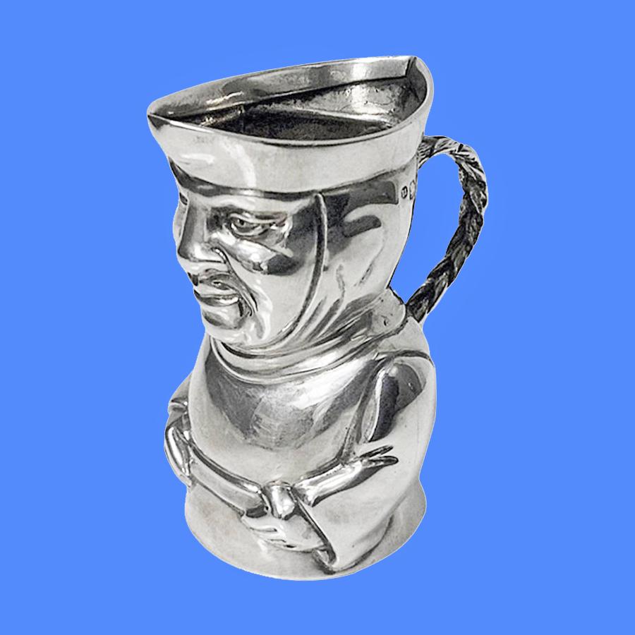 Sterling silver toby cream jug, London 1882, Thos Smiley. The jug depicting a toby form monk, braided handle. Measures: Height 3 1/8 inches. Weight: 87.64 grams.