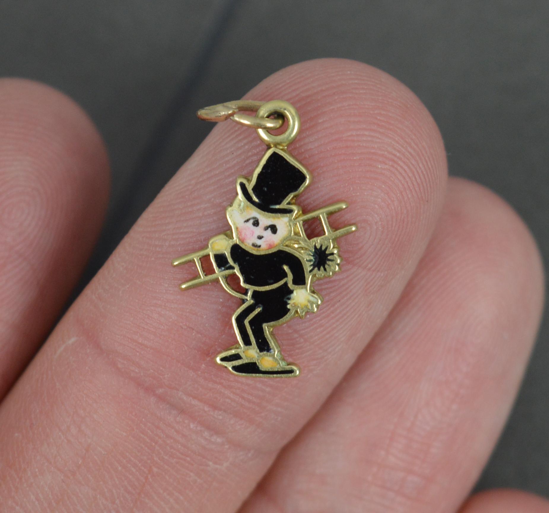 A solid 14 carat gold and enamel charm pendant.
A vintage example.
Chimney sweep design.

Condition ; Excellent. Crisp design. Issue free.

Please view photographs though note they are significantly bigger than the actual item and show any blemishes