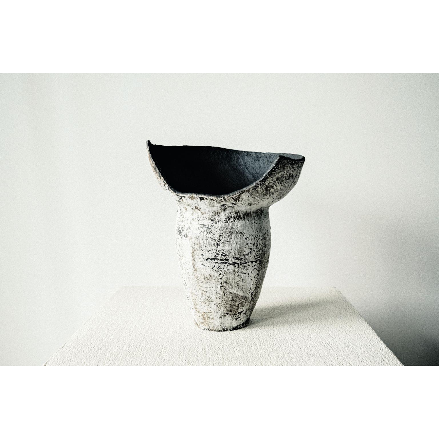 November's Vase .02 by Cécile Ducommun
Dimensions: D22 x H33 cm
Materials: Stoneware.

Hand modeled stoneware, fired at 1250 degrees. May contain water.

