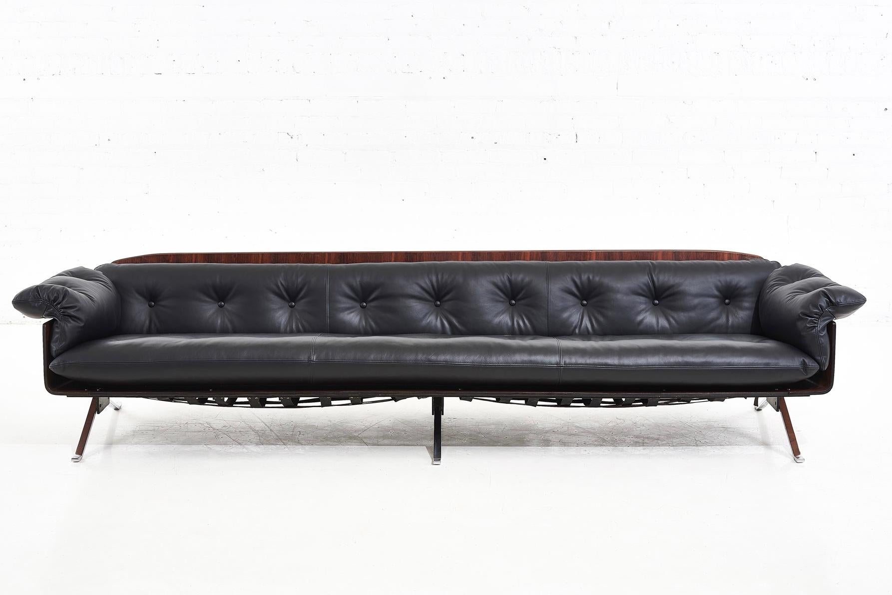Brazilian Jacaranda Rosewood sofa by JD Moveis, 1960. Fully restored and reupholstered in black leather.