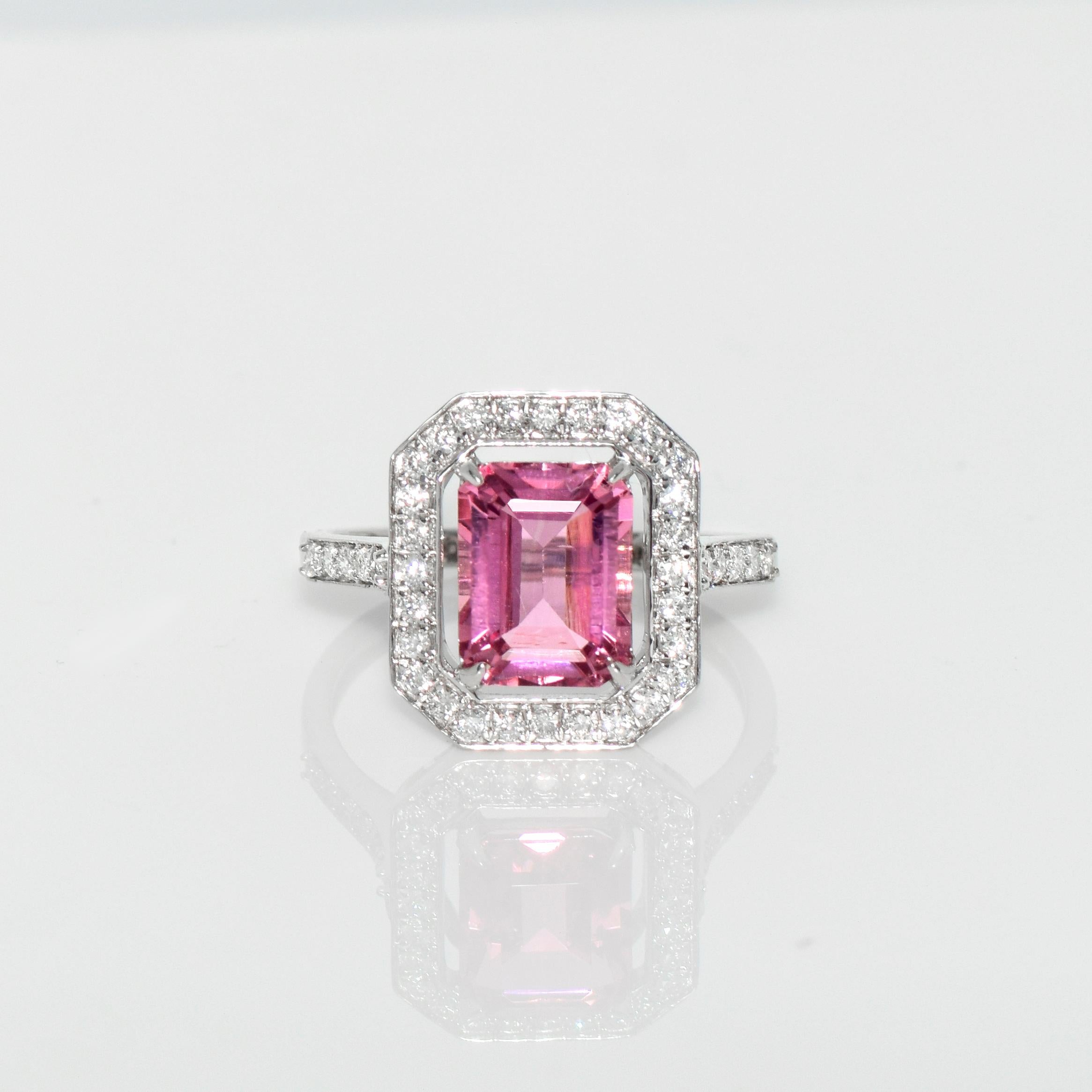 *IGI 14K 2.28 Ct Top Pink Tourmaline&Diamonds Engagement Ring*

Natural top pink Tourmaline weighing 2.28 ct set on 14K white gold pave' band with FG VS natural round brilliant cut diamonds weighing 0.35 ct.

The halo design with high-grade gems and