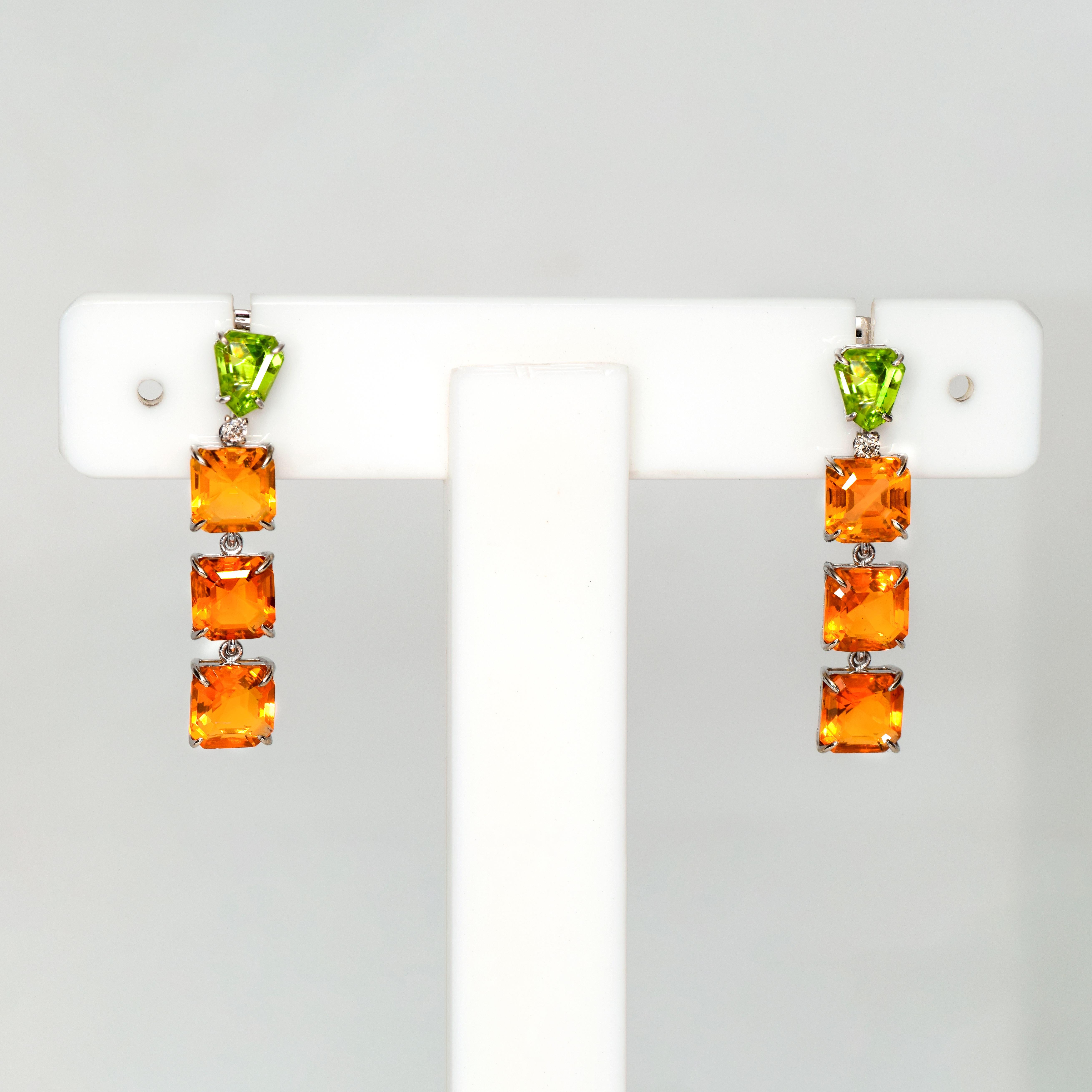 *IGI 14K 6.86 Carat Orange Fire Opal&Peridot Antique Art Deco Drop Earrings*

IGI-certified eight pieces of natural intense orange fire Opal weighing 6.86 ct set with genuine intense green Peridot weighing 1.70 ct and natural pink diamonds weighing