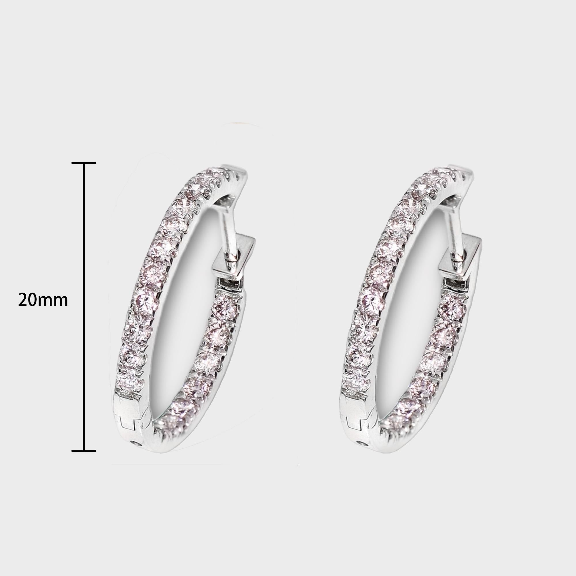 *IGI 14K 0.98 ct Natürliche Rosa Diamanten Hoop Ohrringe*

Mit 42 runden, natürlichen, rosafarbenen Diamanten mit einem Gewicht von 0,98 Karat besetzt, die in ein Band mit Zackenfassung aus 14 Karat Weißgold montiert sind.

Mit IGI-Bericht Nr.