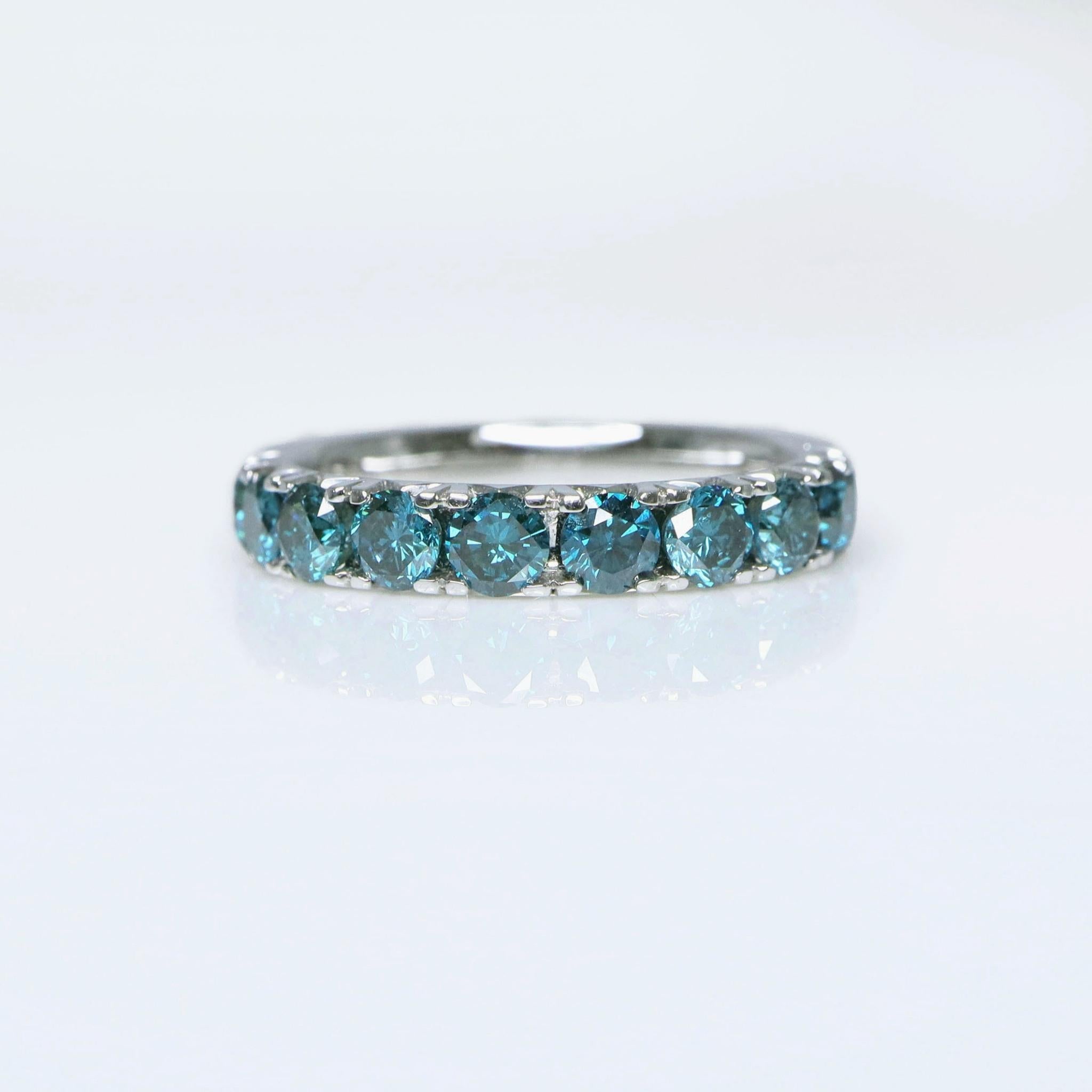 *IGI 14k 1.30 Ct Natural Blue Diamonds Eternity  Engagement Ring*
14K white gold eternity band set with 10 pieces of IGI-certified natural blue diamonds weighing 1.30 ct.

Unique swallow shape design on the side.

Main Stone
Variety: Natural