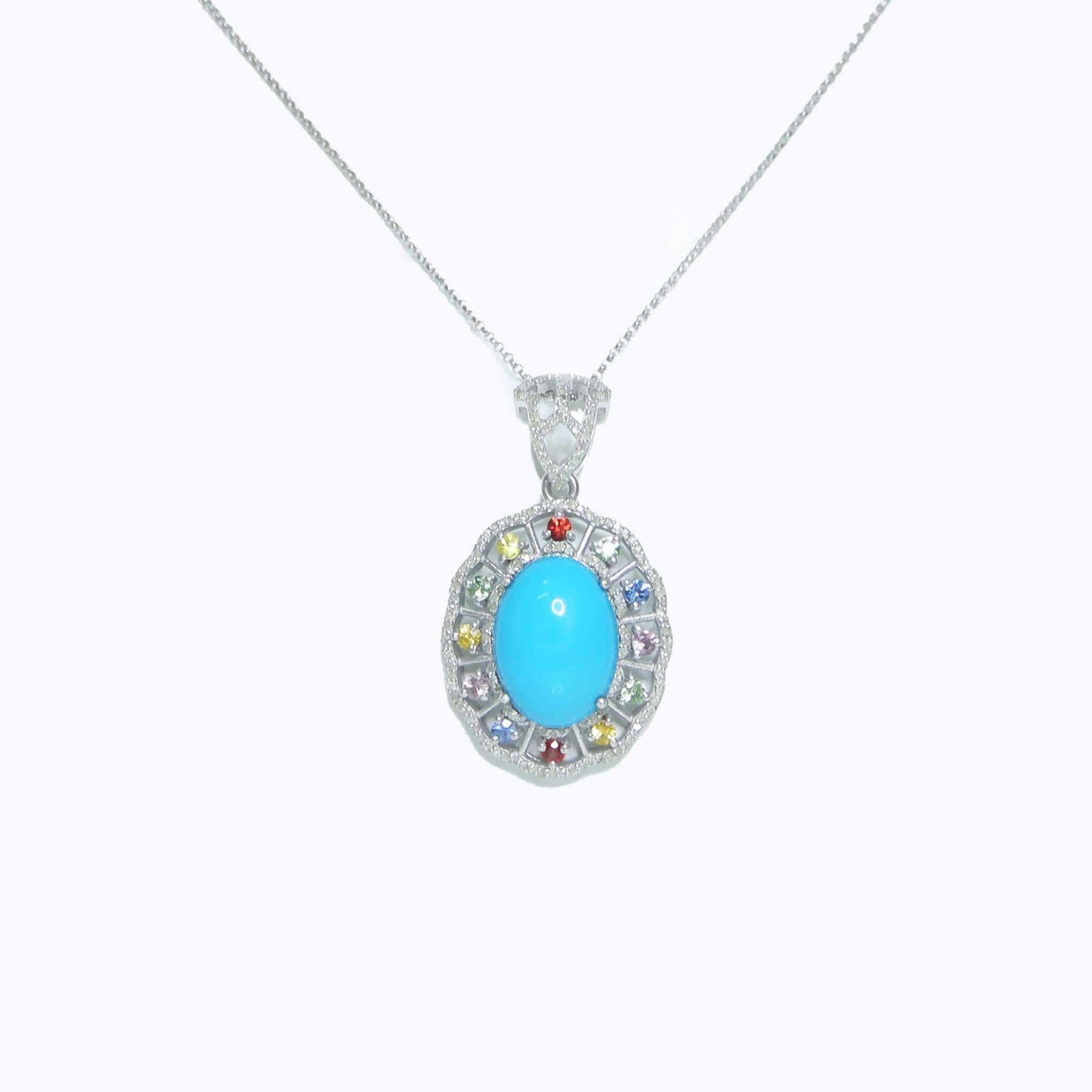 * Silver 11.20 ct  Natural Turquoise Diamonds Antique Pendant Necklace*
This ring features an 11.20-carat natural blue Turquoise set on a silver band and accented with natural HI SI diamonds weighing 0.74 carats and natural sapphires weighing 1.20