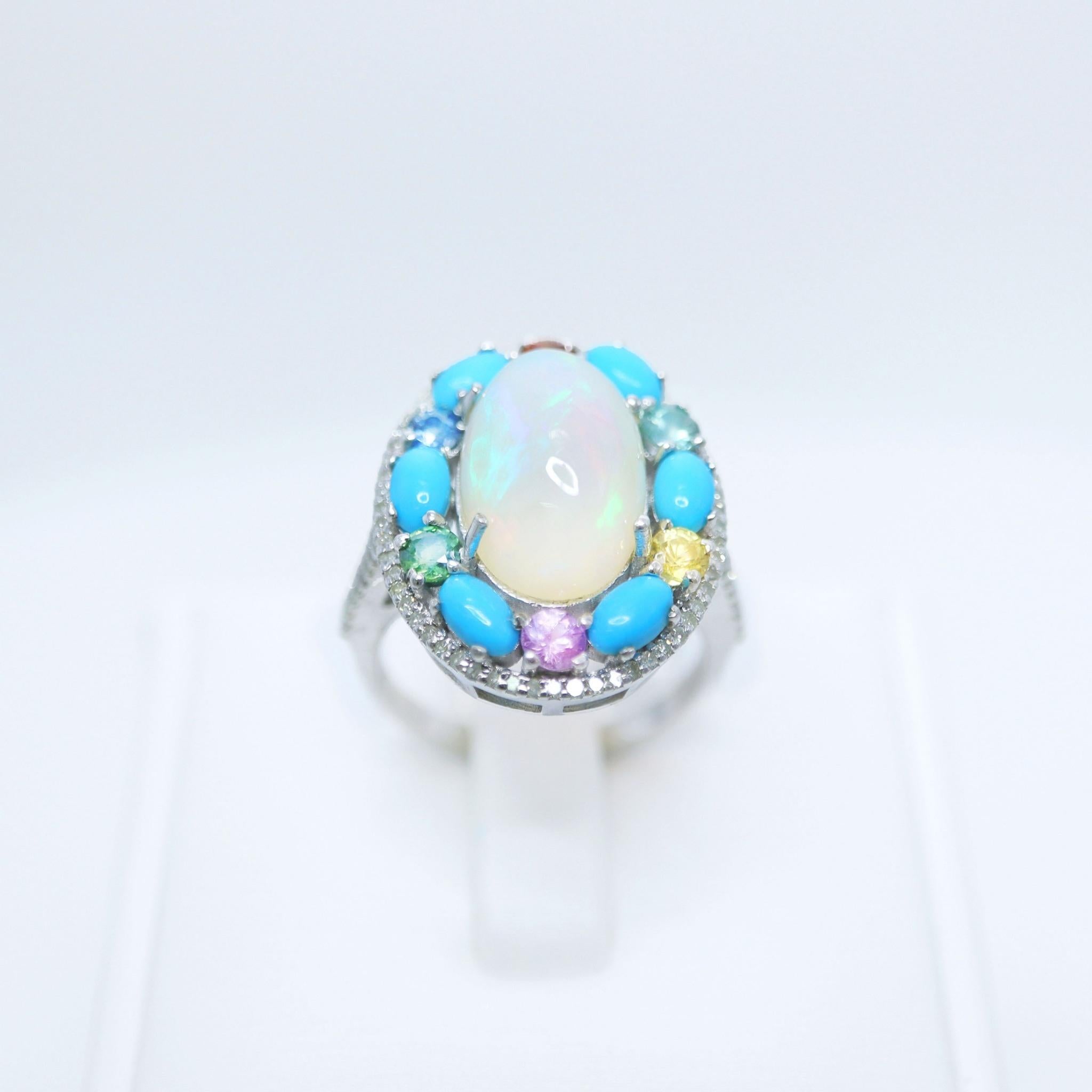 *Silver 4.35 ct  Natural Color Play Opal Diamonds Antique Engagement Ring*
This ring features a 4.35-carat natural white Opal with a color-play effect. It is set on a silver band and accented with natural HI SI diamonds weighing 0.42 carats and