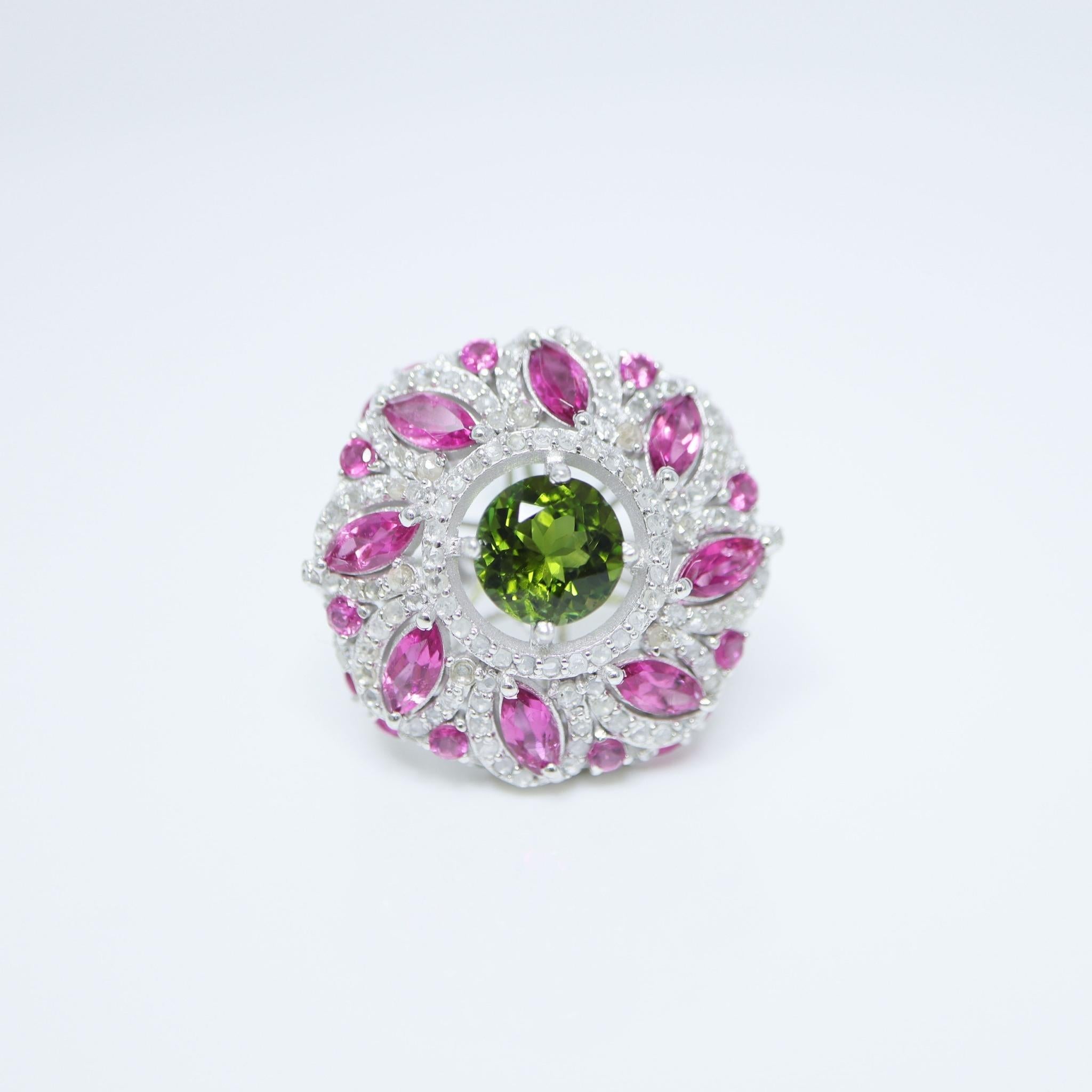 *Silver 4.53 ctw  Natural Tourmaline Diamonds Antique Engagement Ring*
This ring features a 2.00-carat natural green tourmaline set on a silver band and accented with natural HI SI diamonds weighing 1.29 carats and natural rubylite weighing 2.53 ct.