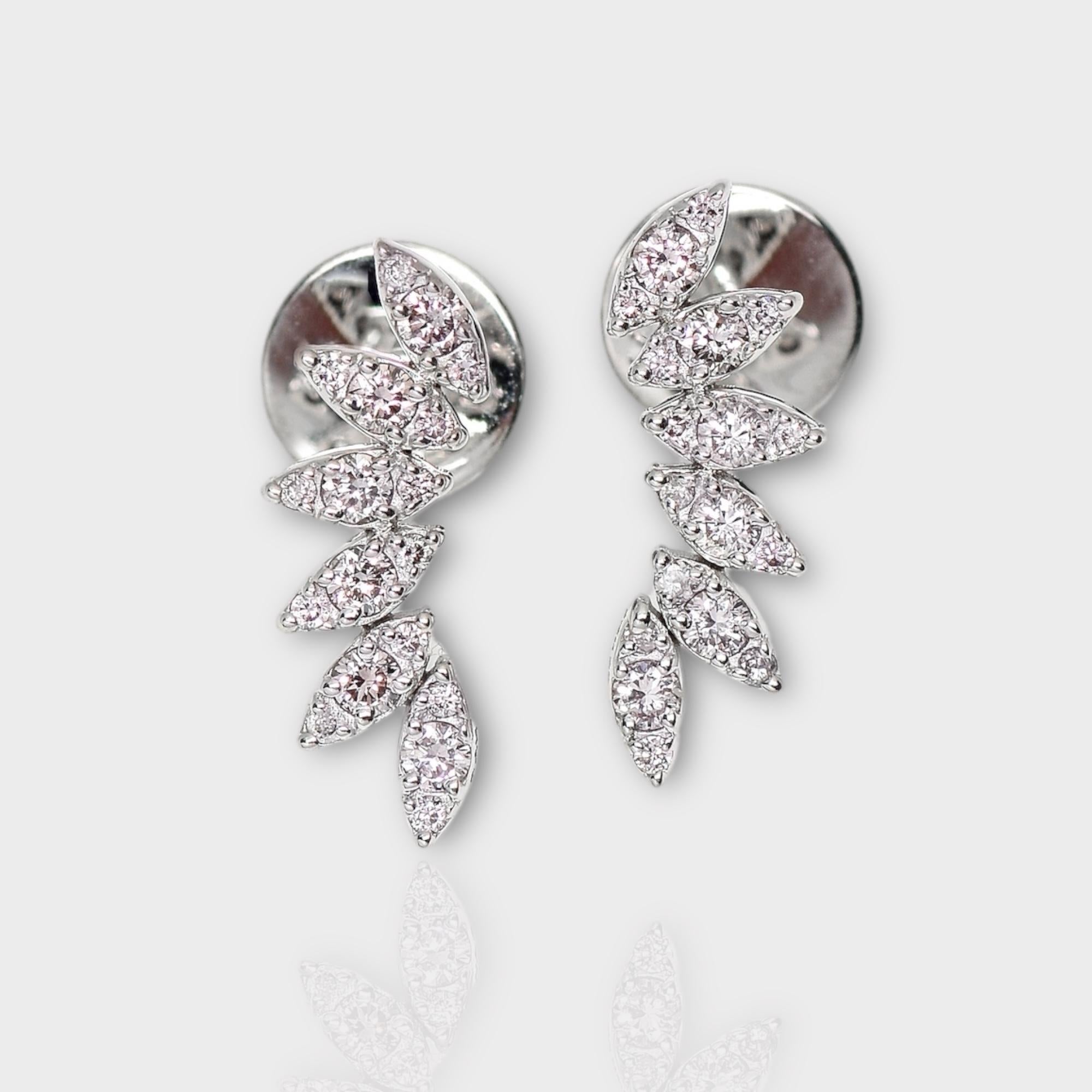 *IGI 14K 0.33 ct Natural Pink Diamonds Art Deco Design Stud Earrings*

This band features a stunning design with an art deco crafted from 14K white gold. It is set with natural pink diamonds weighing 0.33 carats.

These earrings feature colorful