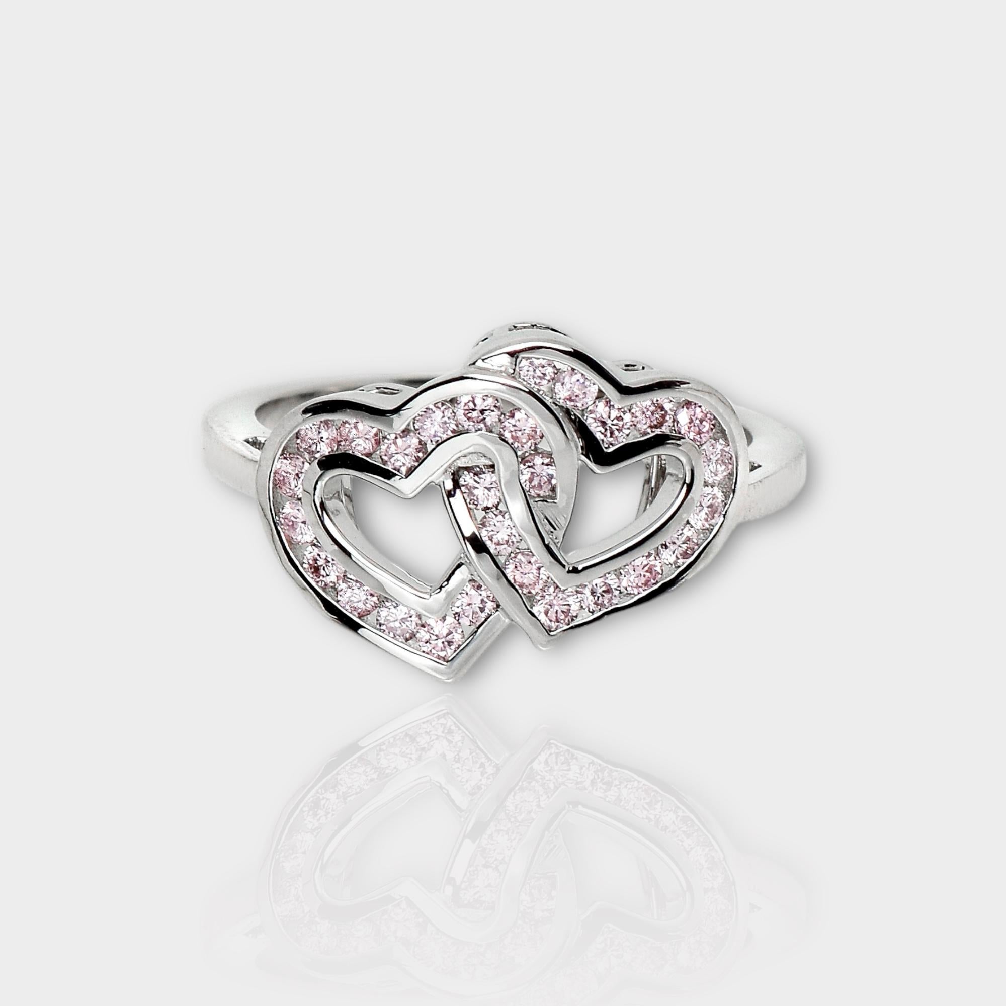 *IGI 14K 0.41 ct Natural Pink Diamonds Cross Heart Design  Antique Art Deco Ring*

This band features a stunning design with a cross heart crafted from 14K white gold. It is set with natural pink diamonds weighing 0.41 carats.

This ring features