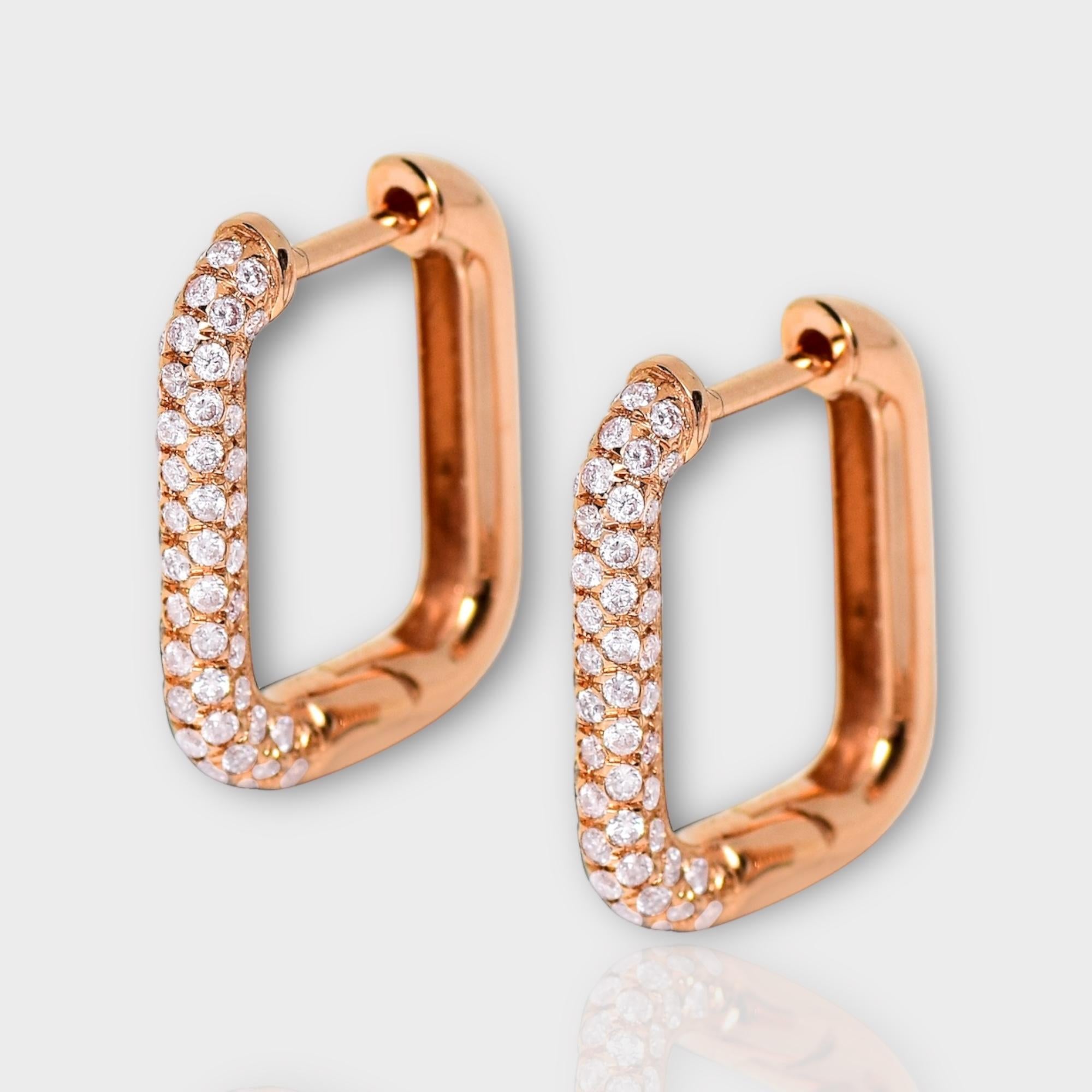 *IGI 14K 0.59 ct Natürliche Rosa Diamanten Hoop Ohrringe*

Dieses Band zeichnet sich durch ein atemberaubendes Design mit einem Reifendesign aus 14K Roségold aus. Er ist mit natürlichen rosa Diamanten von 0.59 Karat besetzt.

Diese Ohrringe mit