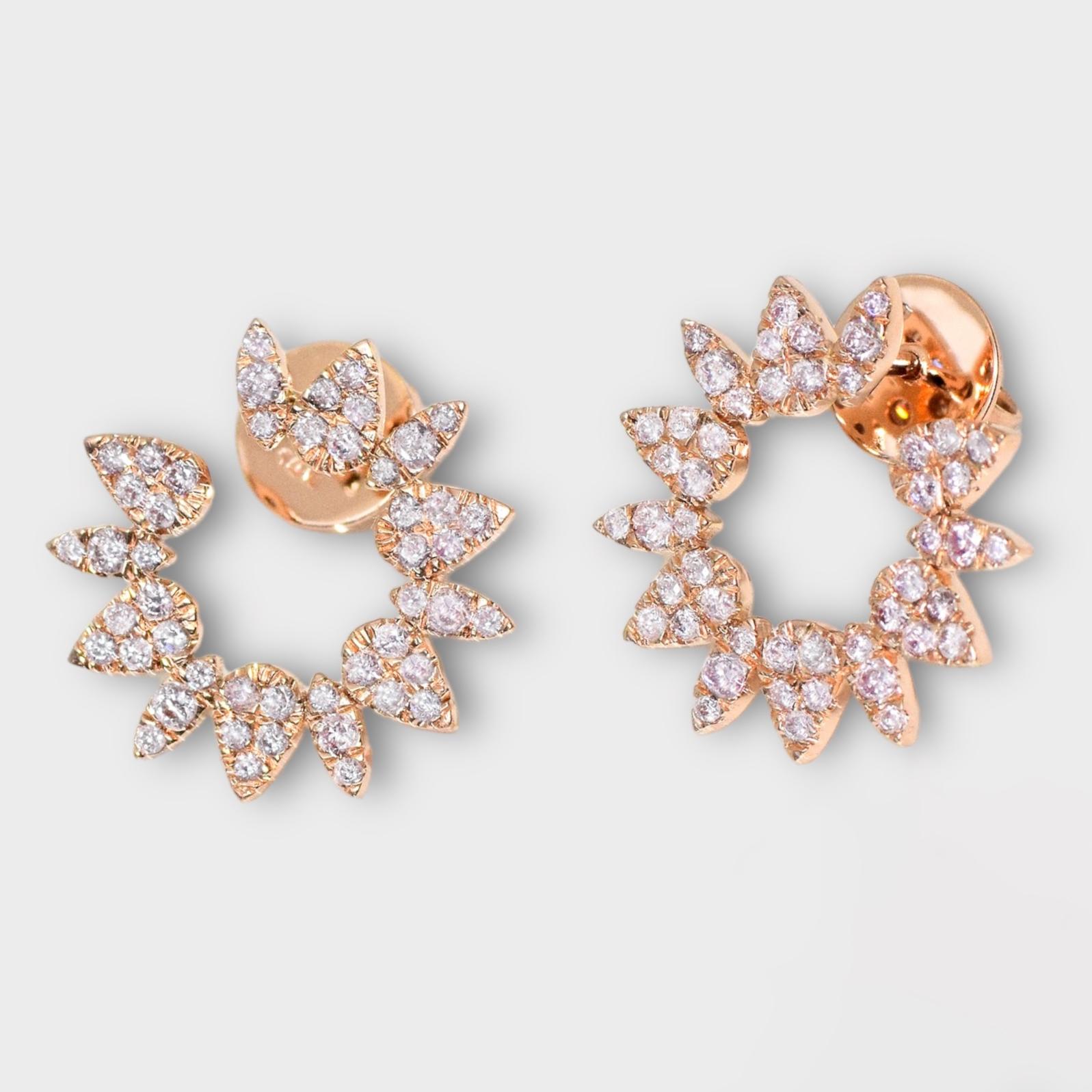 *IGI 14K 0.84 ct Natural Pink Diamonds Radiant Design Stud Earrings*

This band features a stunning design with a radiant crafted from 14K pink gold. It is set with natural pink diamonds weighing 0.84 carats.

These earrings feature colorful natural