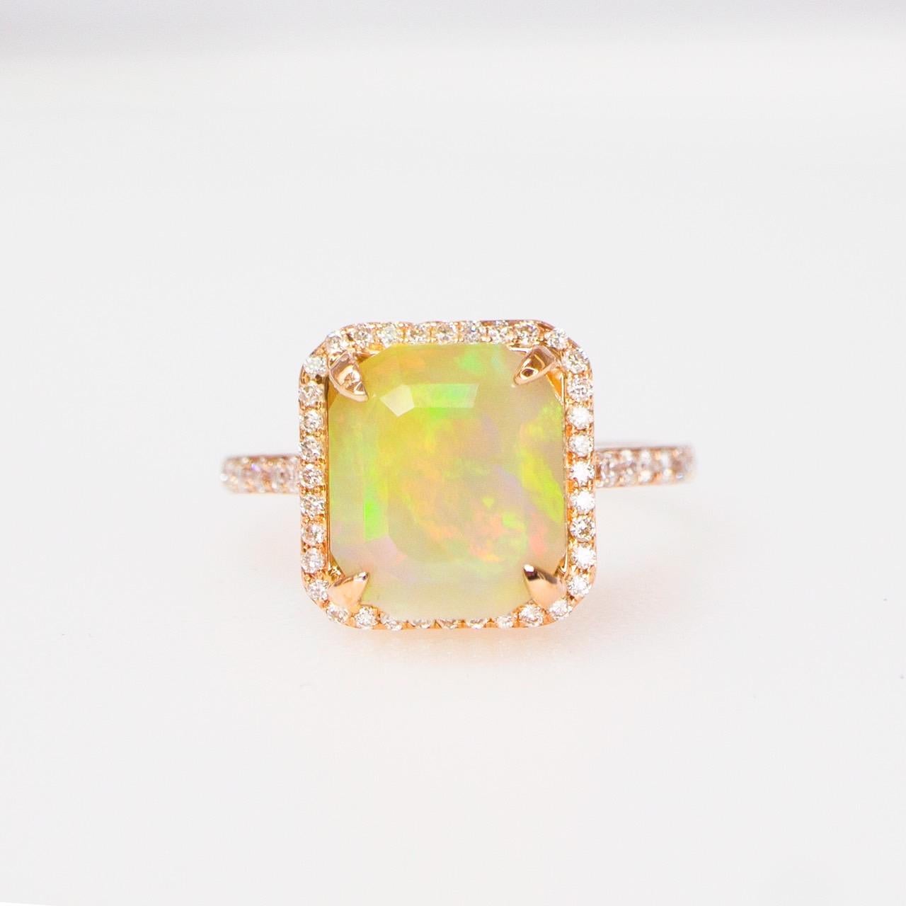 *IGI 14K 3.50 ct  Natural Color Play Opal Diamonds Antique Engagement Ring*
This ring features a 3.50 carat natural orange Opal that is IGI-Certified, with a color-play effect. It is set on a 14K rose gold band and accented with FG VS diamonds