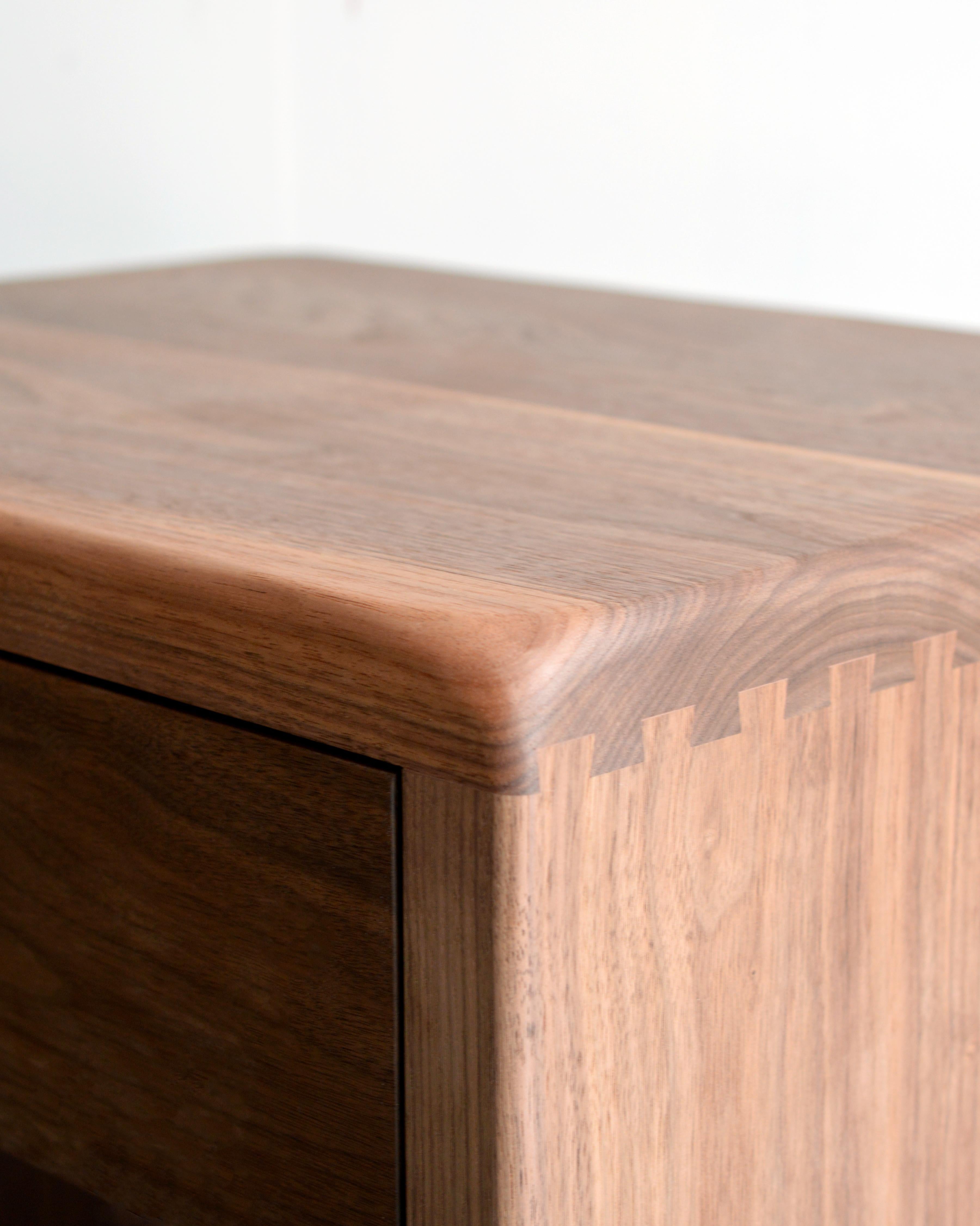 When placing order, please specify which knobs you'd like. Prices may vary depending on knob choice.

This highly customizable nightstand is hand crafted in Pennsylvania. It is made with solid walnut and features dovetail joinery. This piece comes