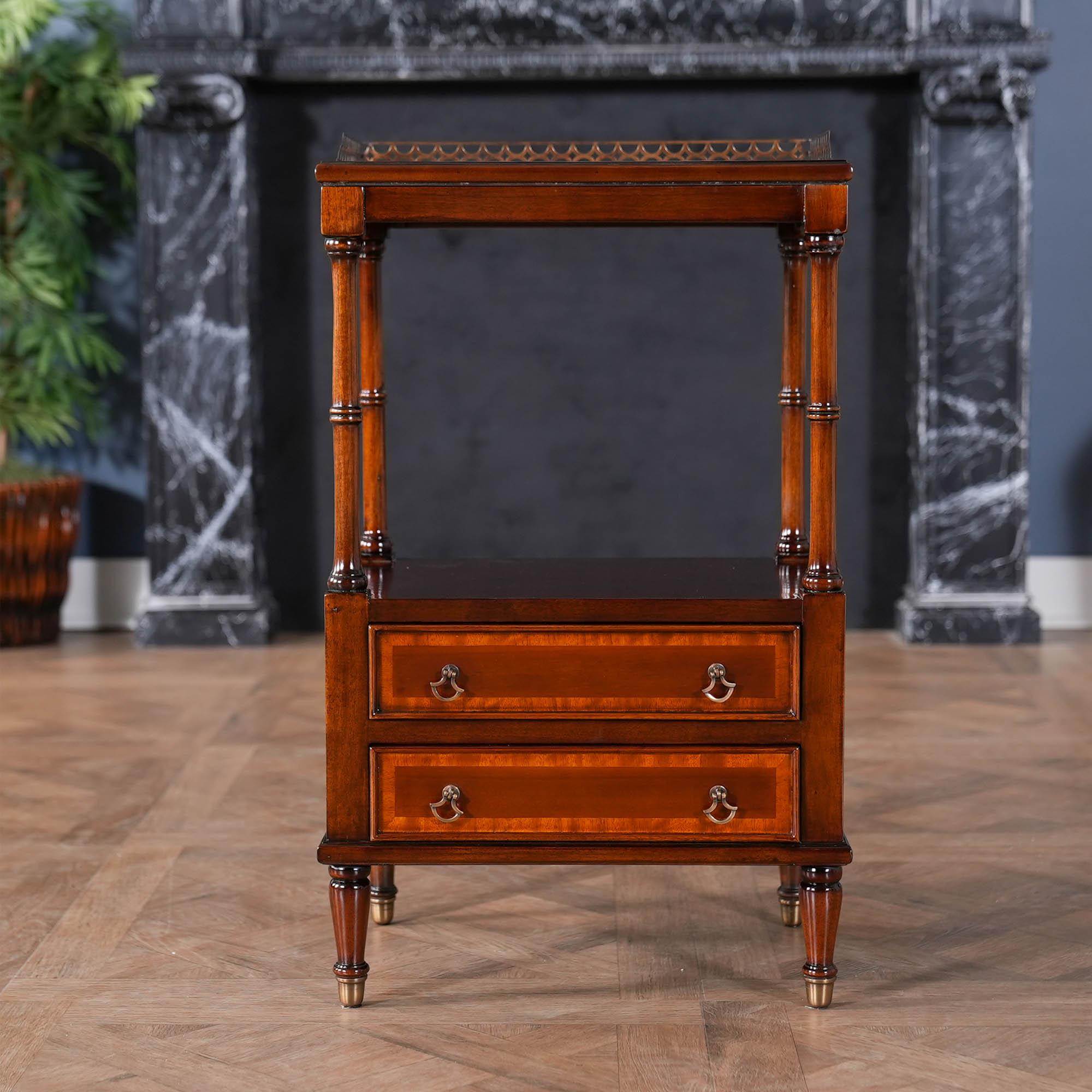 An attractive Mahogany Two Drawer End Table suitable for use as either an end table or as a night stand. Hand carved details and designer quality solid brass hardware give it a great look in any setting. Frequently purchased in pairs for opposite