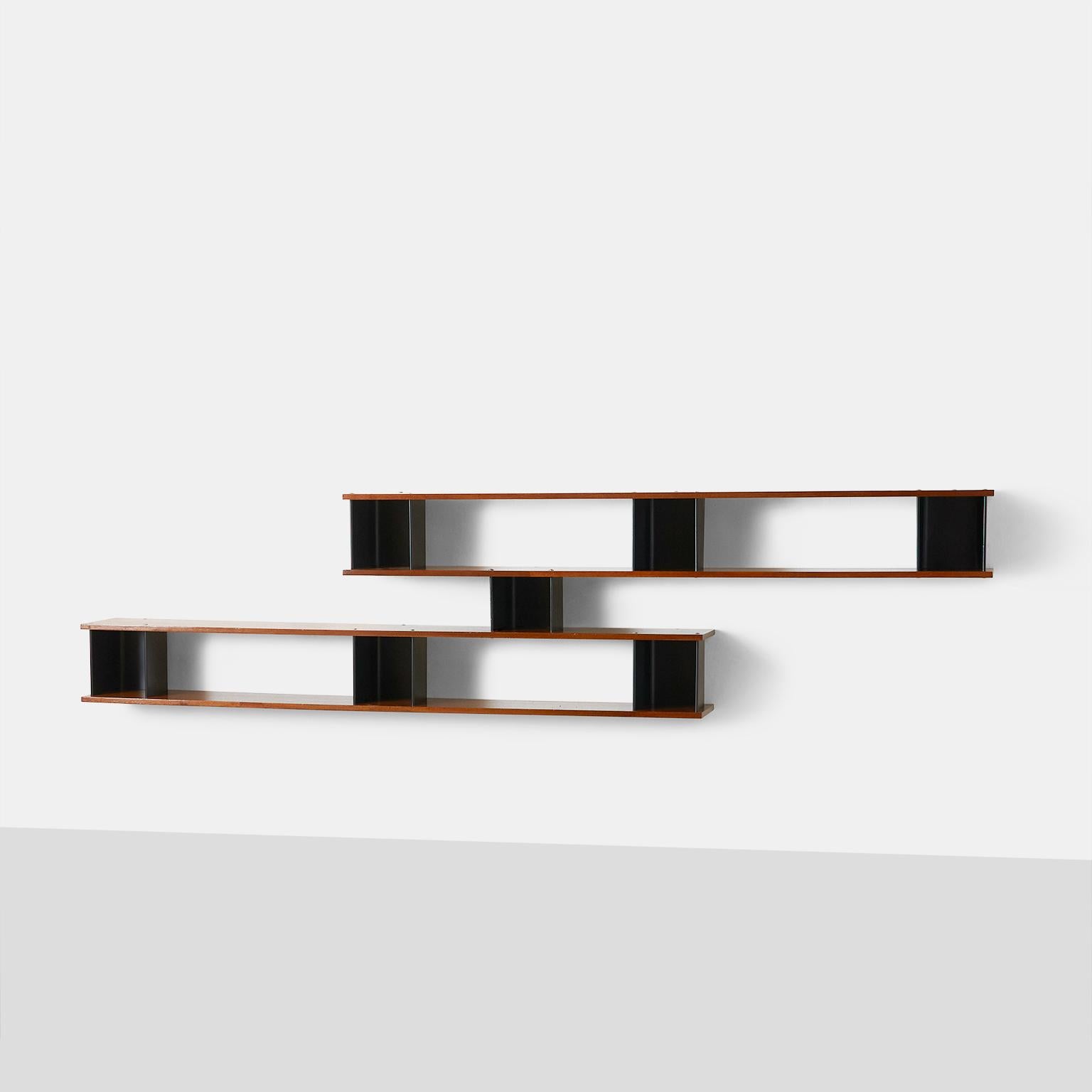 “Nuage” wall shelf by Charlotte Perriand
Ash-veneered plywood, painted steel, aluminum.
Metal produced by Métal Meubles and wood produced by Négroni,
France, circa 1956.