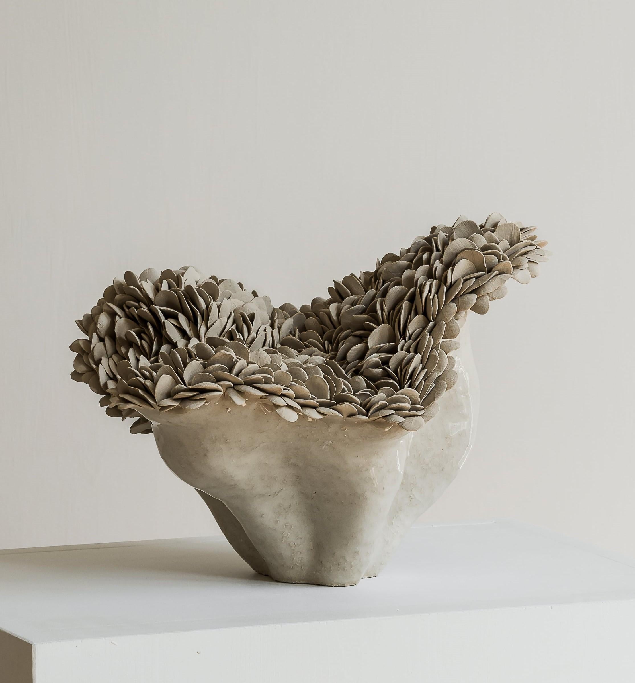 Nubes small sculpture by Hanna Heino
Dimensions: D 23 x W 28 x H 22 cm
Materials: Handbuilt, stoneware clay
Also available in different dimensions. 


Hanna Heino is a contemporary clay artist from Finland known for her delicate form language