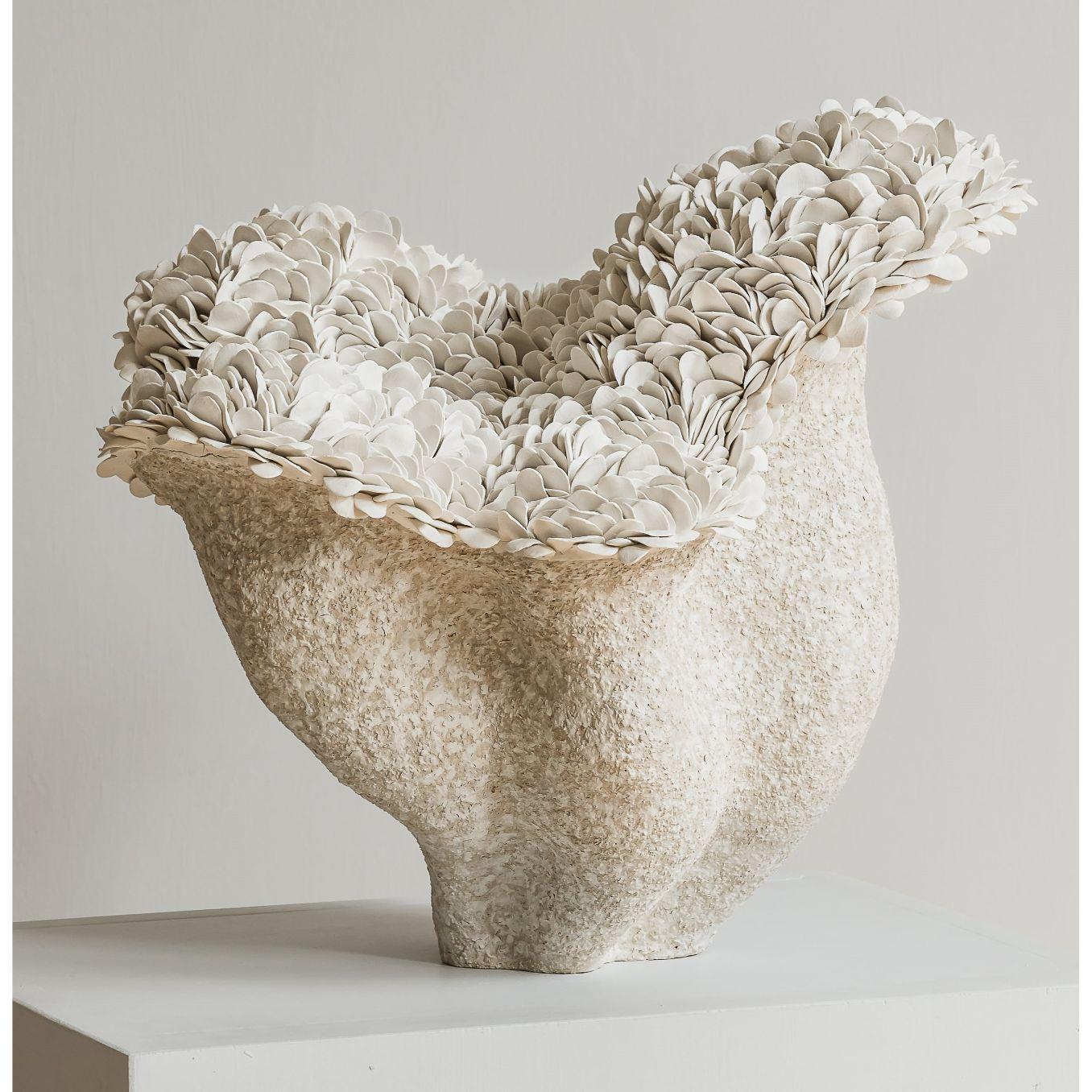 Nubes wide sculpture by Hanna Heino
Dimensions: D 35 x W 39 x H 35 cm
Materials: Handbuilt, Stoneware clay, Porcelain, Engobe.
Also available in different dimensions. 


Hanna Heino is a contemporary clay artist from Finland known for her