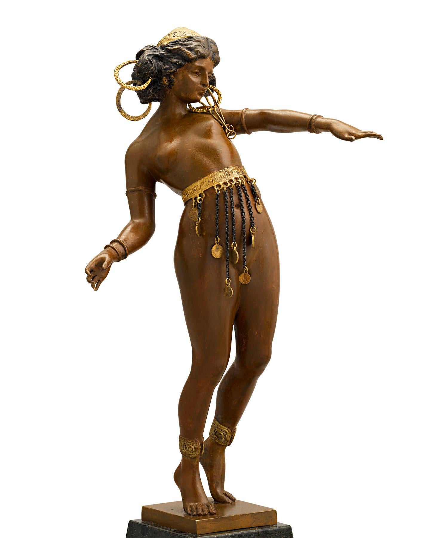 Exemplary of Art Nouveau elegance, the sensuous female form is the focus of this Viennese bronze by Austrian sculptor Carl Kauba (1865 - 1922). The intricately detailed bronze captures the supple form of an exotic Nubian dancer in a true