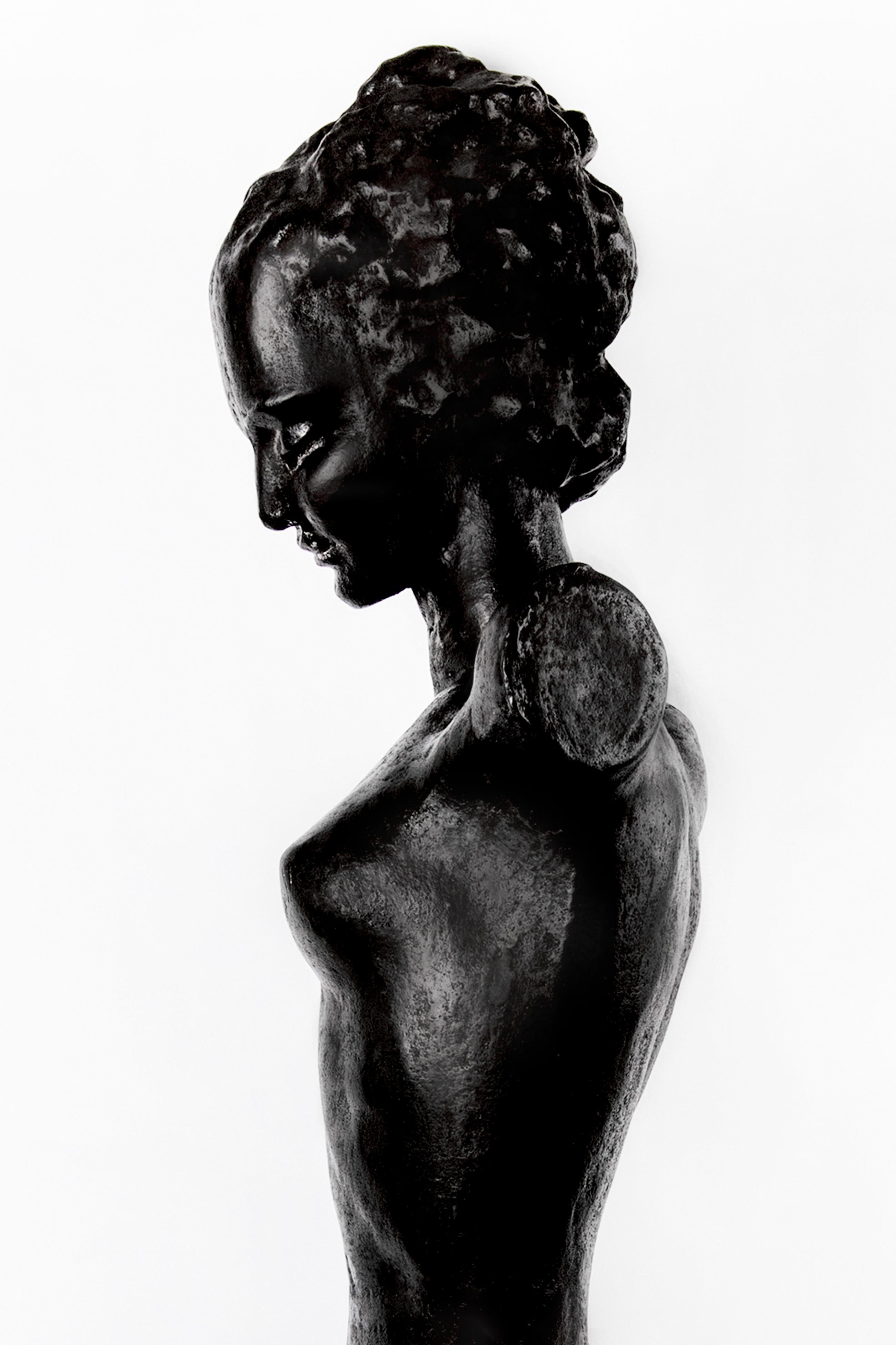 Nude bronze Art Deco statue on a sycamore veneered wooden base. French origin from 1930.