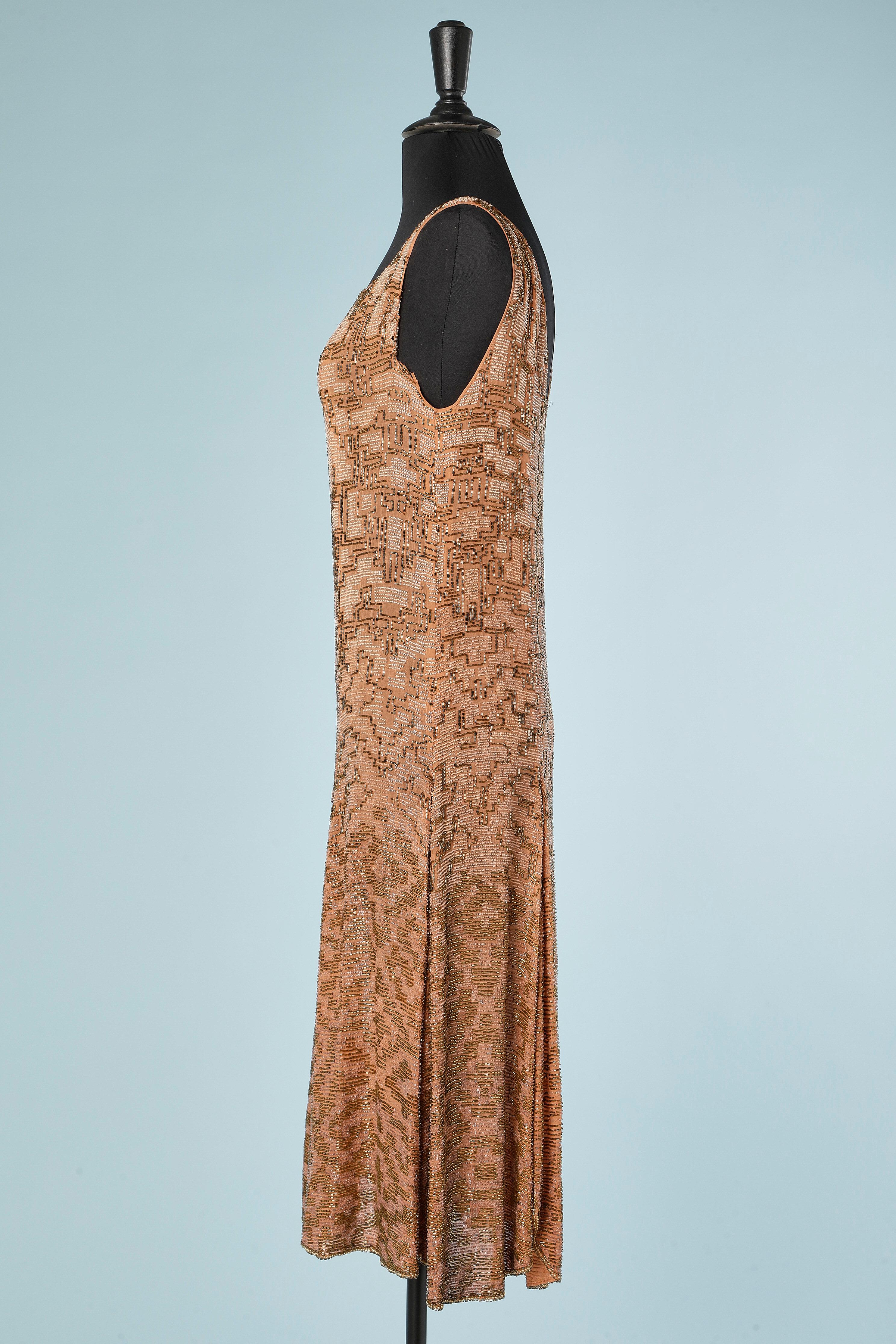 Women's Nude color full embroideries beaded dress on a silk chiffon base Circa 1925's