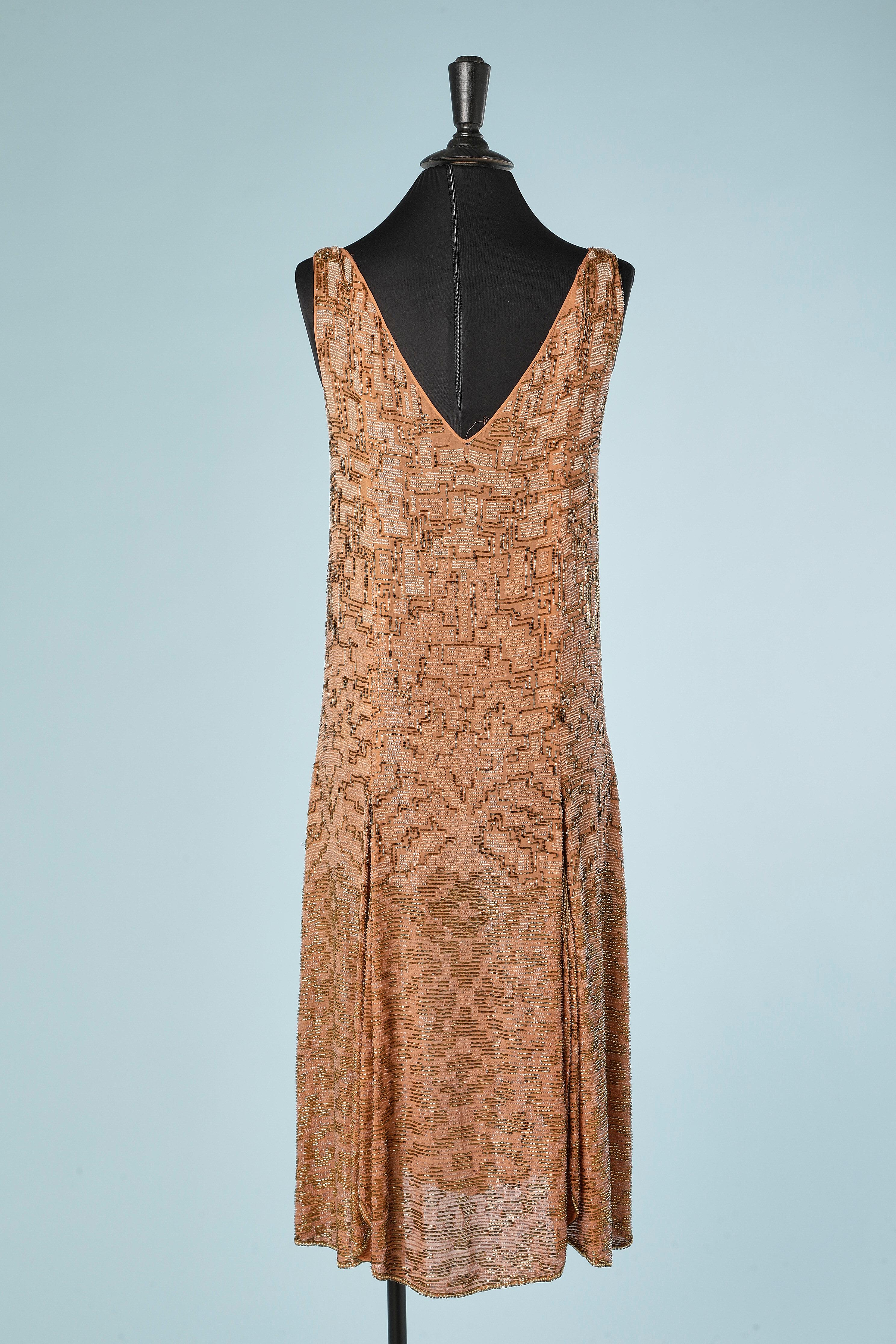 Nude color full embroideries beaded dress on a silk chiffon base Circa 1925's 1