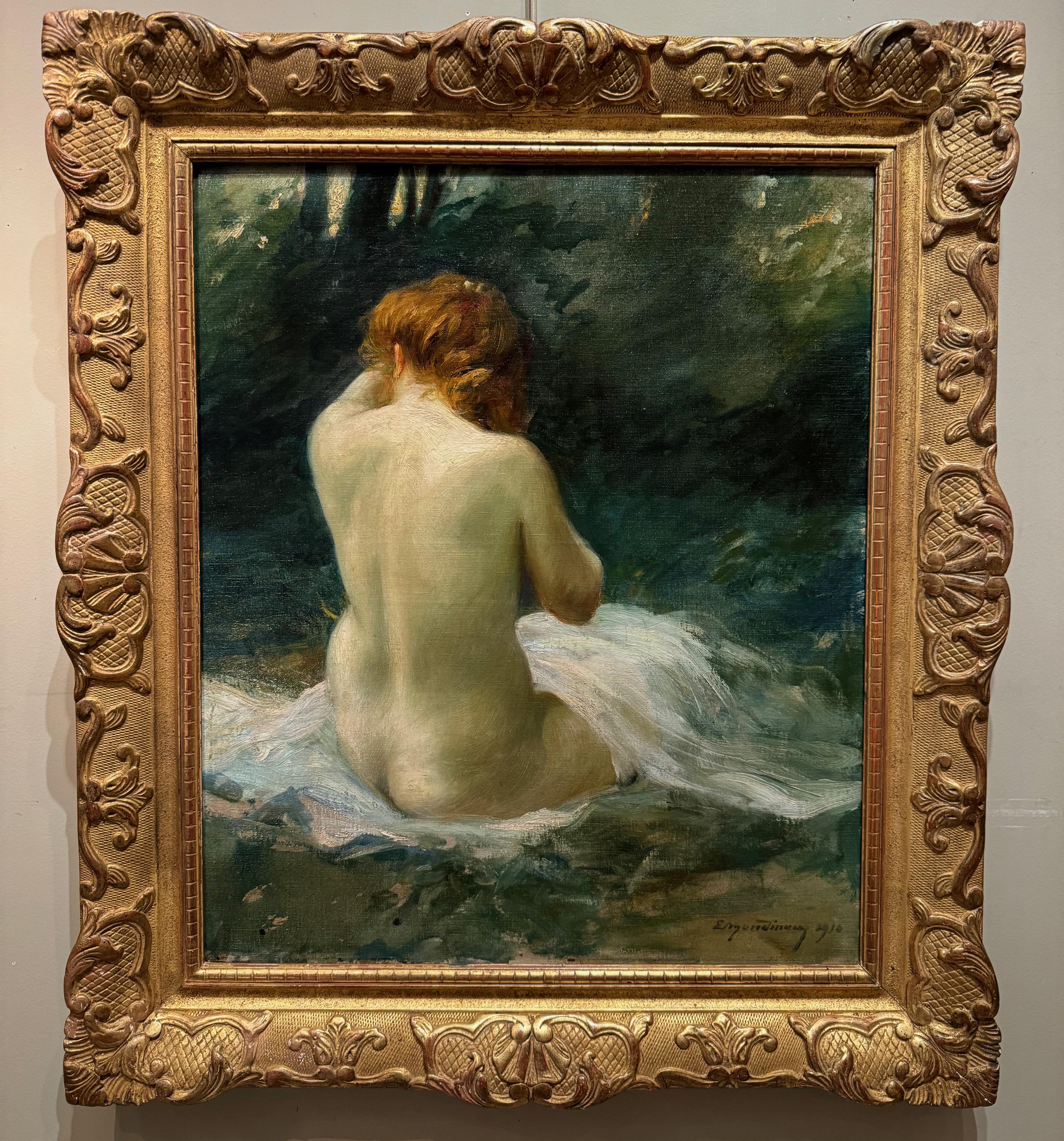 Oil on canvas showing a young redheaded woman with her hair up in a bun, sitting naked in the grass.
Great sensuality of the model painted in nature, signed lower right E.MONDINEU, 1910.
Etienne MONDINEU entered the Bordeaux Fine Arts School in