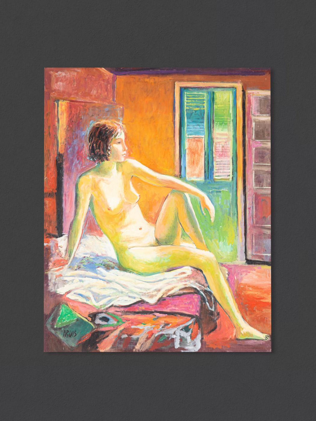 woman sitting on edge of bed painting