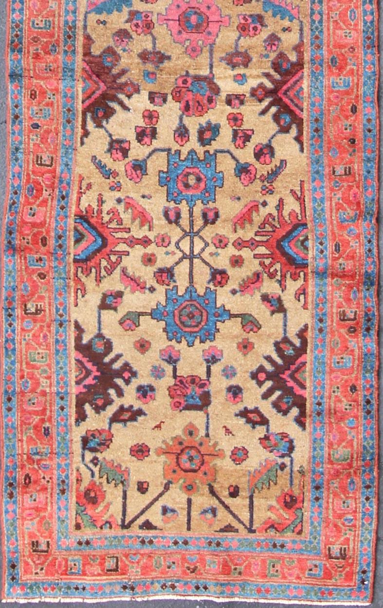 Antique Persian Hamadan Long Runner with Geometric Motifs in Light Camel Field.
All-over geometric design Persian antique Hamedan runner in multicolored tones, rug 19-0209, country of origin / type: Iran / Hamedan, circa 1900

This antique Persian 