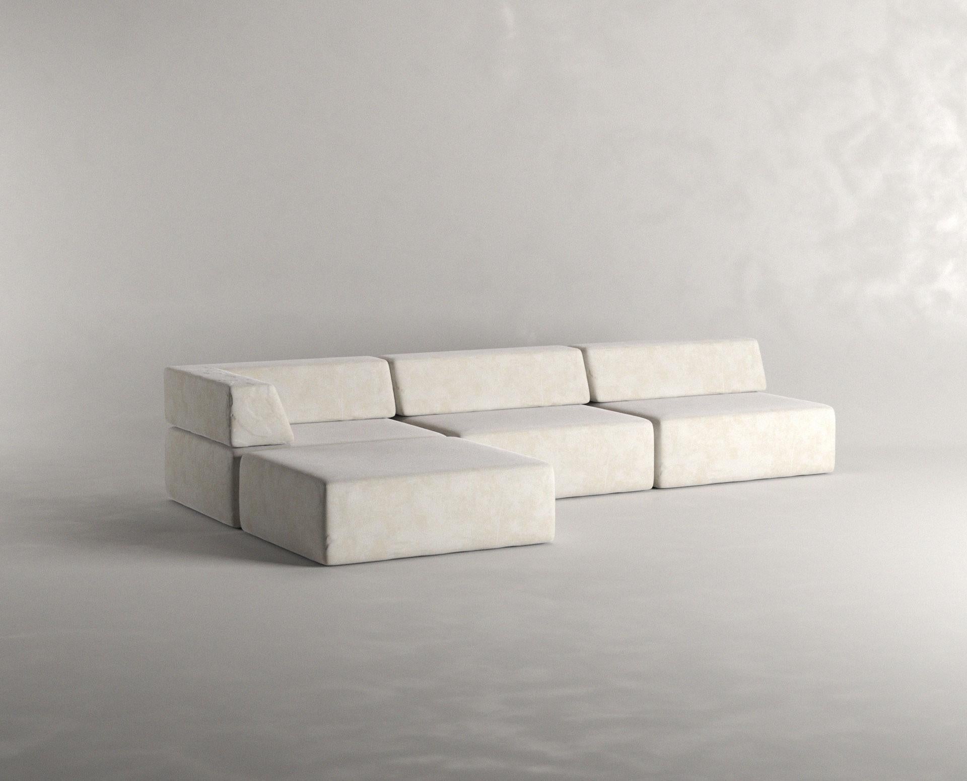 A dynamie piece inspired by its predecesor “Nube Sofa”; this extraction simplifies its geometry even further and plays with the dynamism of modules that allow the user an intimate interaction with the piece.
