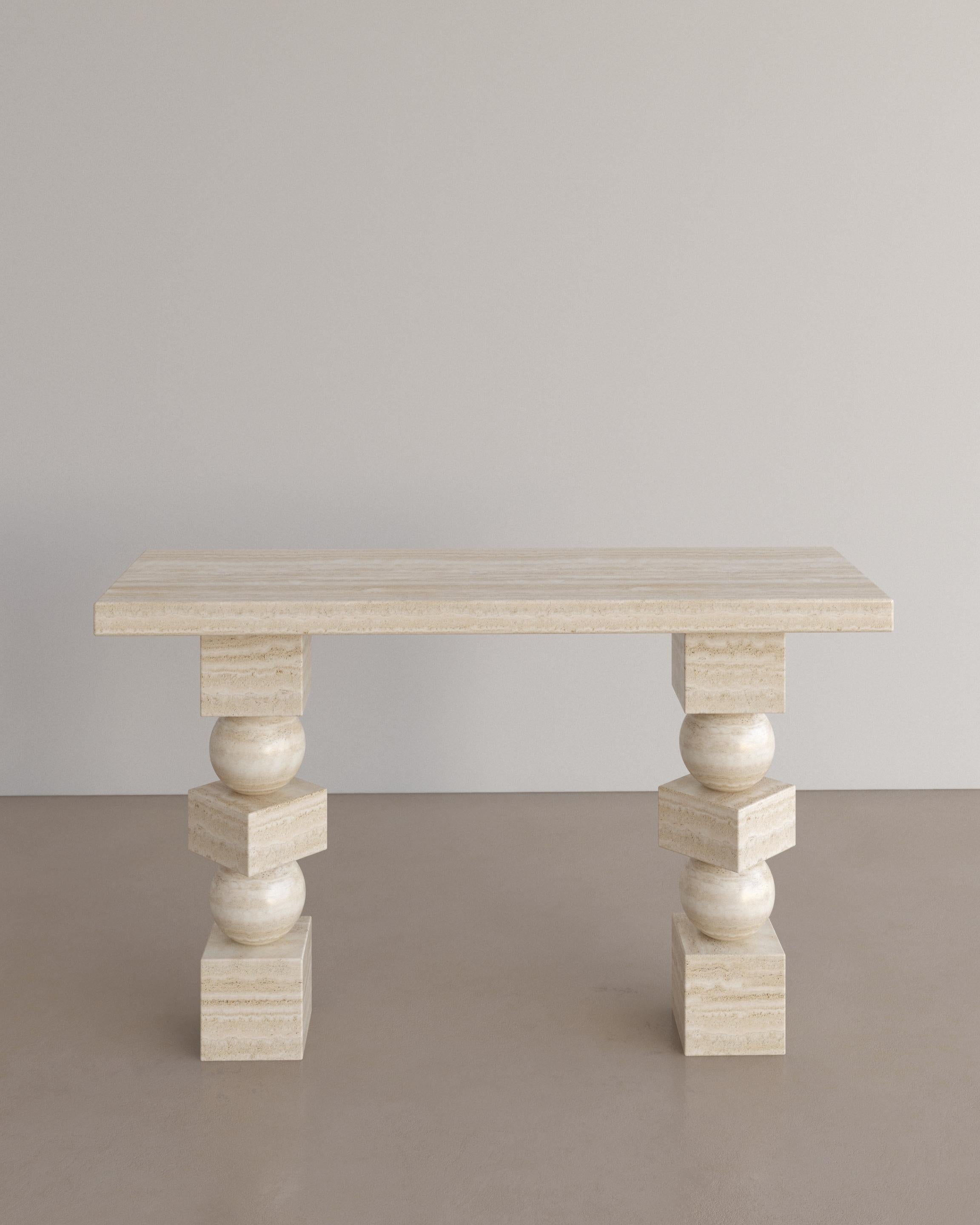 The Sufi Console Table celebrates proportion, scale and ancestral power. Three simple geometric shapes, stacked in a sequence bursts with undeniable energy, courtesy of the natural stone they are carved from. A generous table top defines its