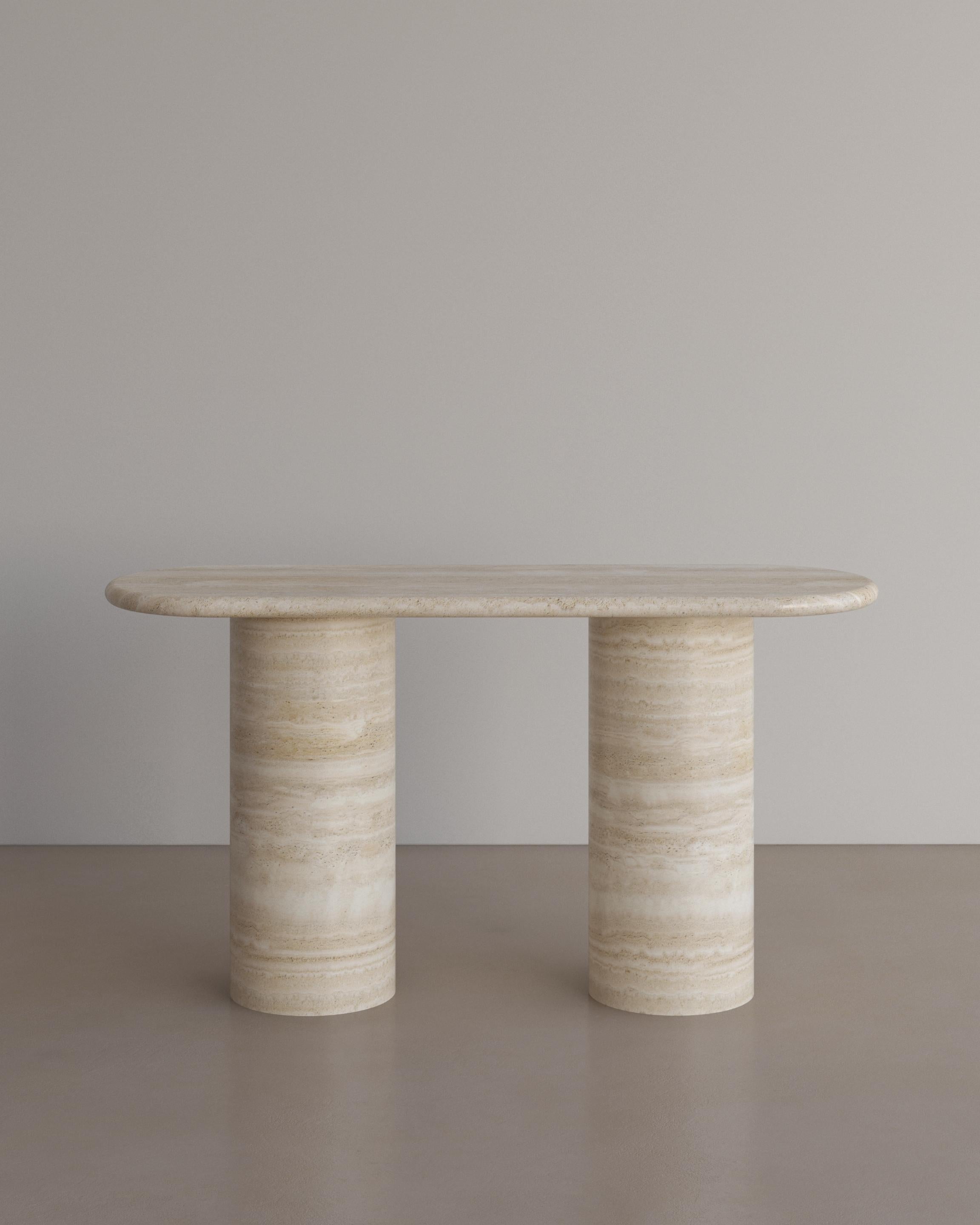 The Voyage Console table in Bianco Travertine by The Essentialist defines life’s simple pleasures in its essential form. Soft planes resting on smooth pillars reflect nature’s aesthetic balance and perfect harmony.

Igniting a dance between