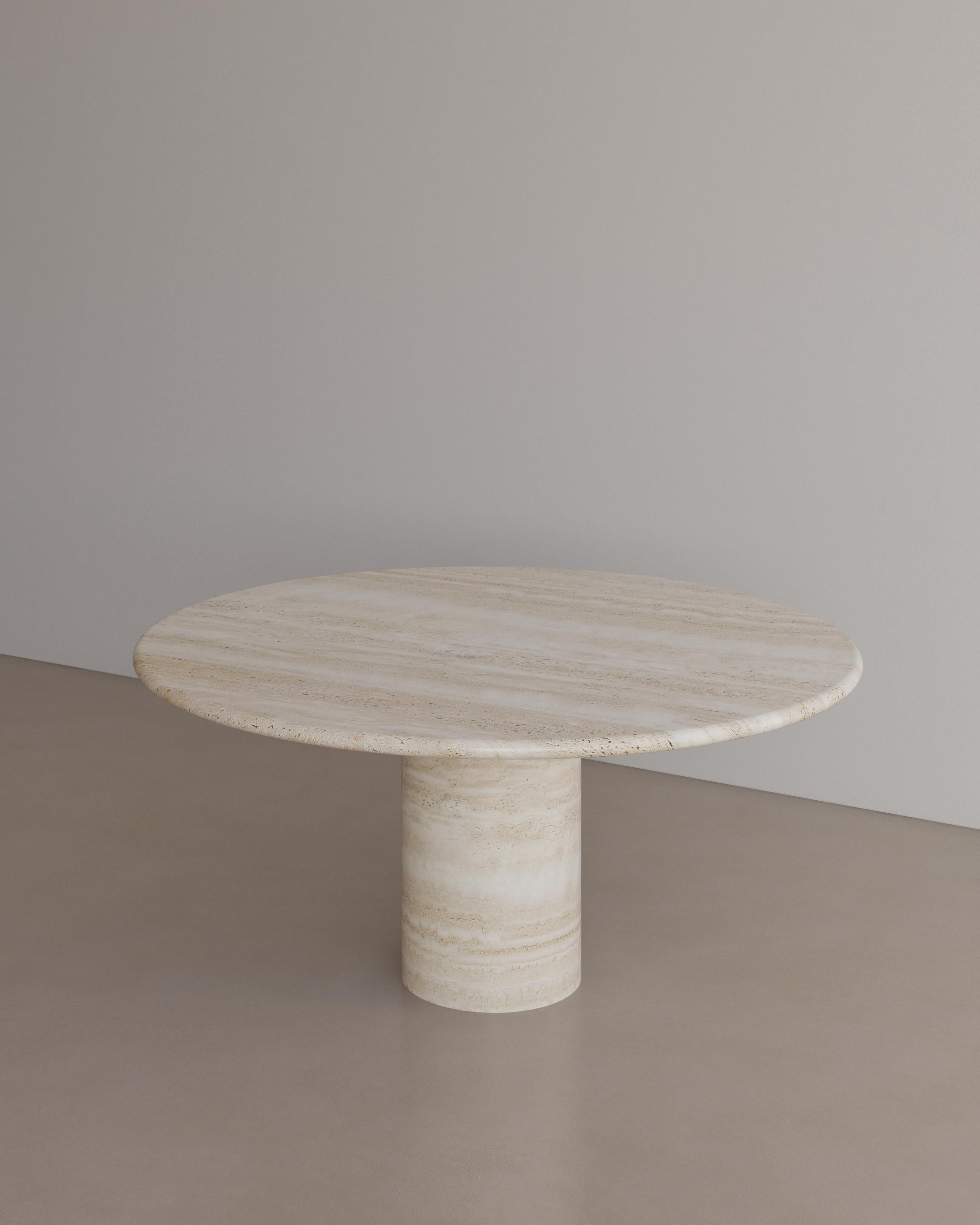 The Voyage Dining Table I in Nude Travertine by The Essentialist celebrates the simple pleasures that define life and replenish the soul through harnessing essential form. Envisioned as an ode to historical elegance, captured through a modern lens