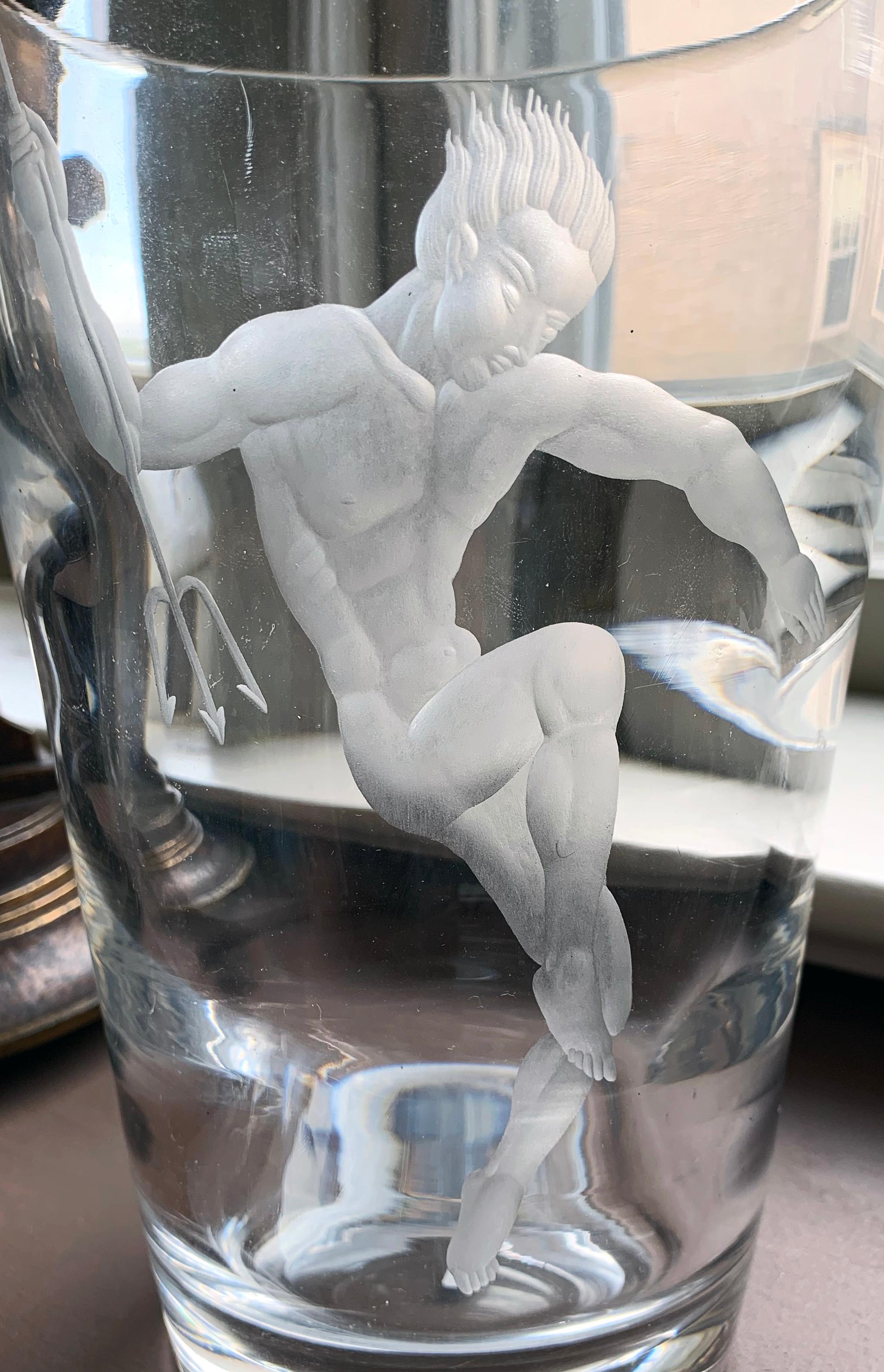 Extraordinary and unique, this remarkable Art Deco glass vase is engraved with a nude Triton figure, holding his trident aloft in readiness to strike. The artist was Emil Weidlich, who came to the Elme Company from Orrefors, which helps to explain