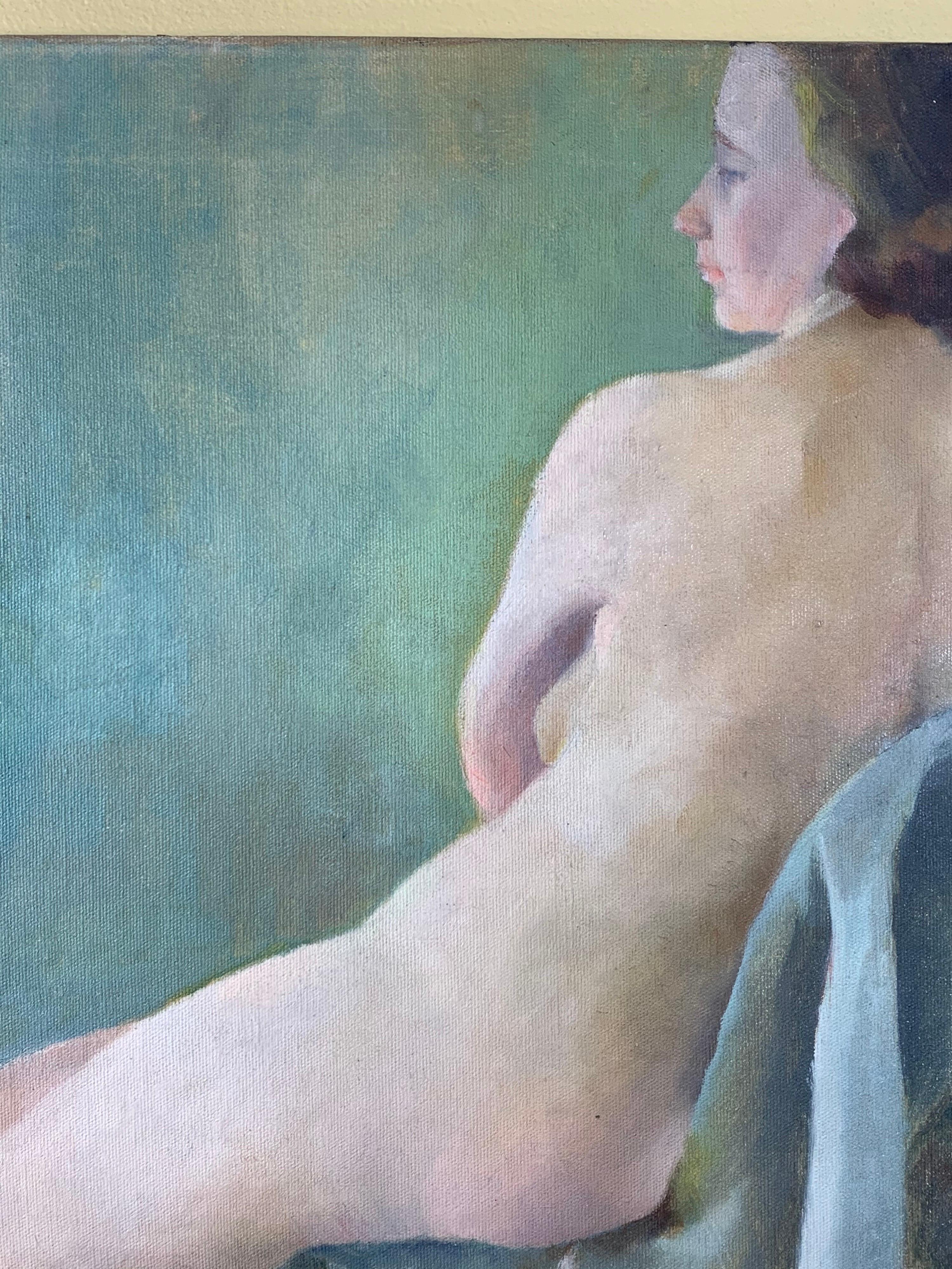 nude woman sitting on chair