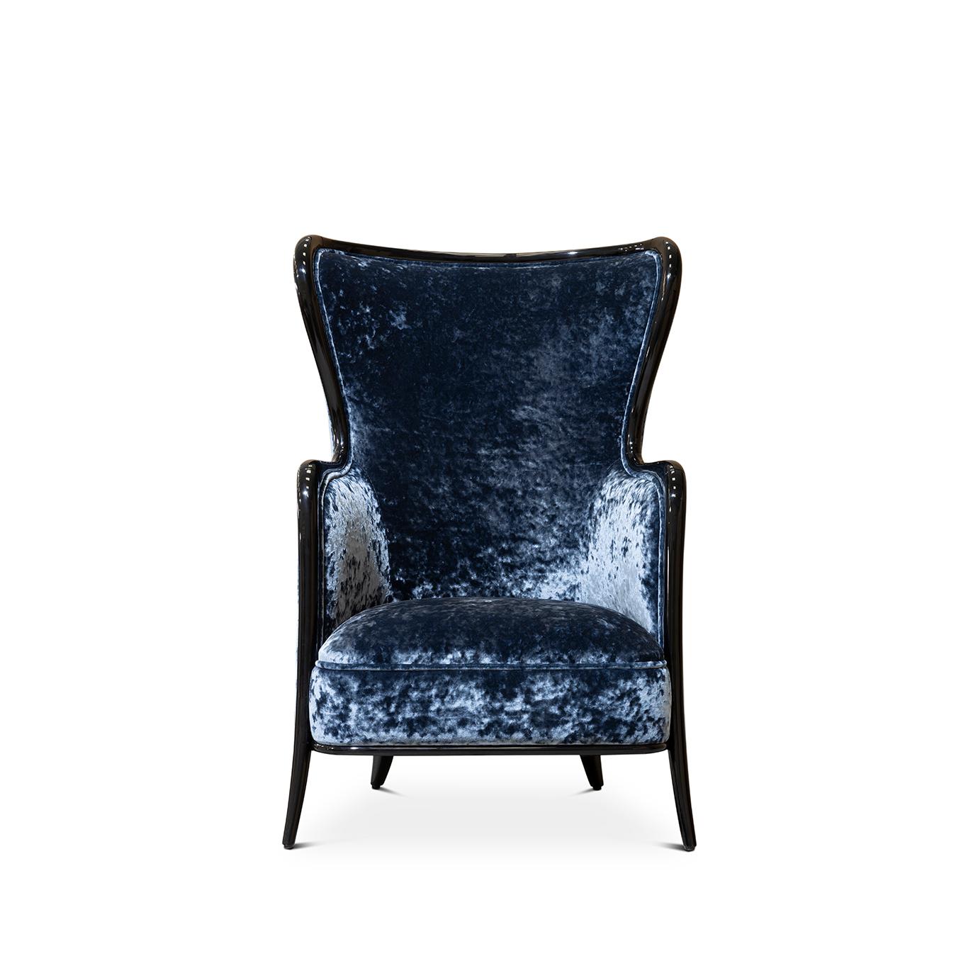 A chic and comfortable occasional chair, the Nudesse High-back is beautifully upholstered in a luxurious blue velvet and elegantly trimmed in black lacquered wood.