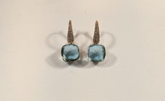 Boucles d'oreilles Nudo en or rose 18 carats, diamants et topaze