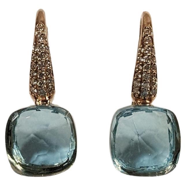 Pendientes Nudo de oro rosa de 18 quilates, diamantes y topacio en venta