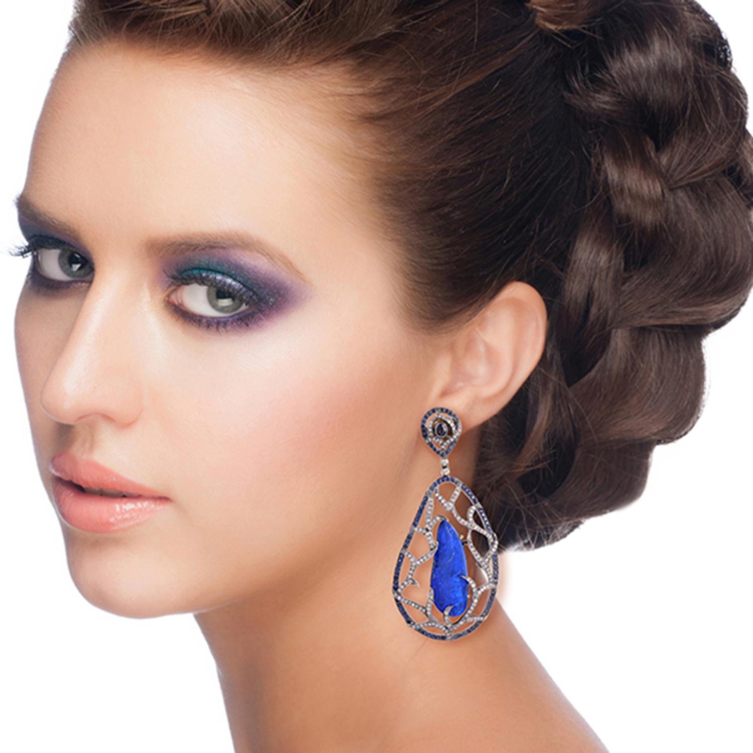 18kt:1.94gms,D:2.53cts,Slv:18.012gms, Sapp:2.55cts,OPAL DOUBLET:17.31cts
