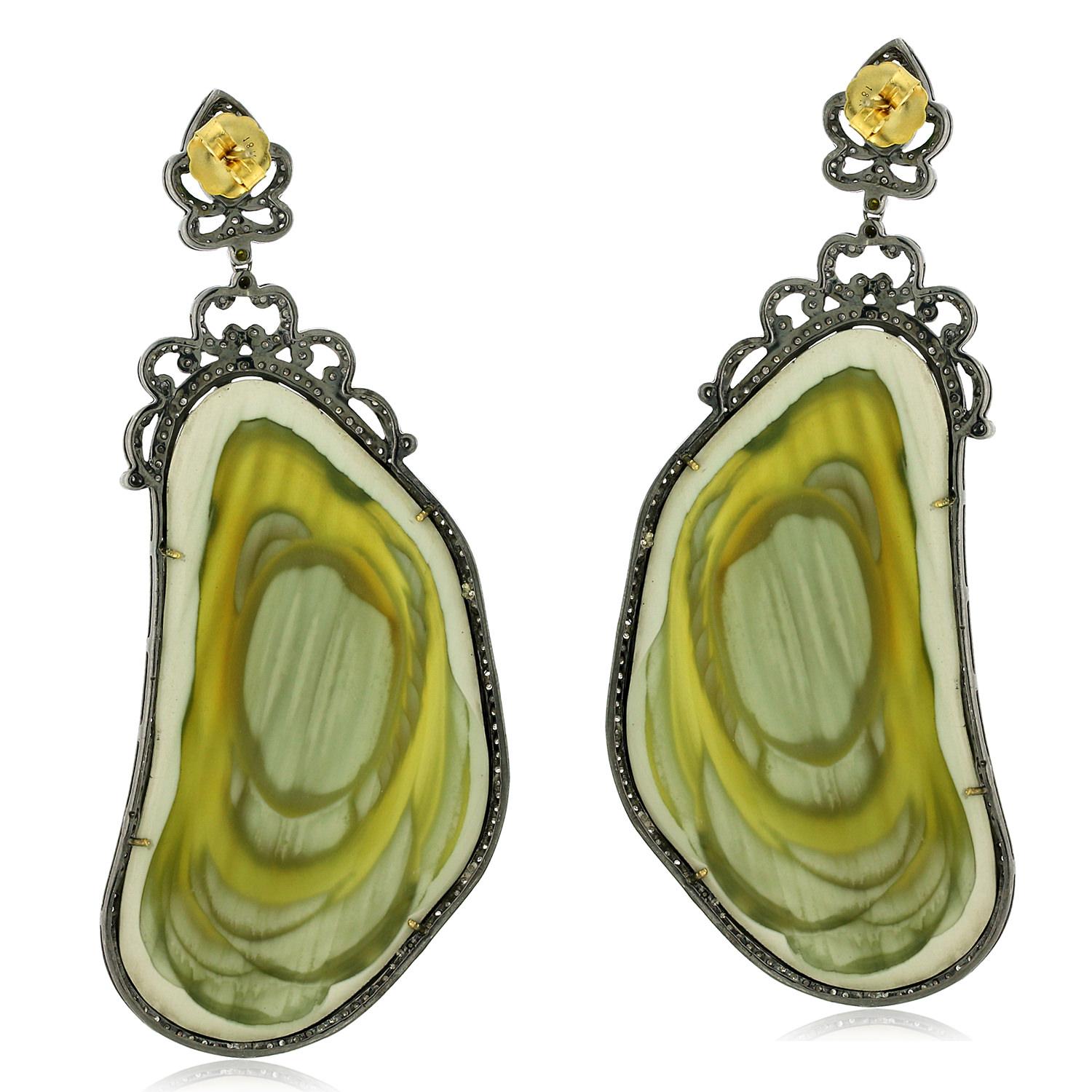 Nugget-shaped jasper dangle earrings crafted in 18k gold featuring emerald and pave diamonds. Add a touch of luxury to your look with these unique, stylish earrings.