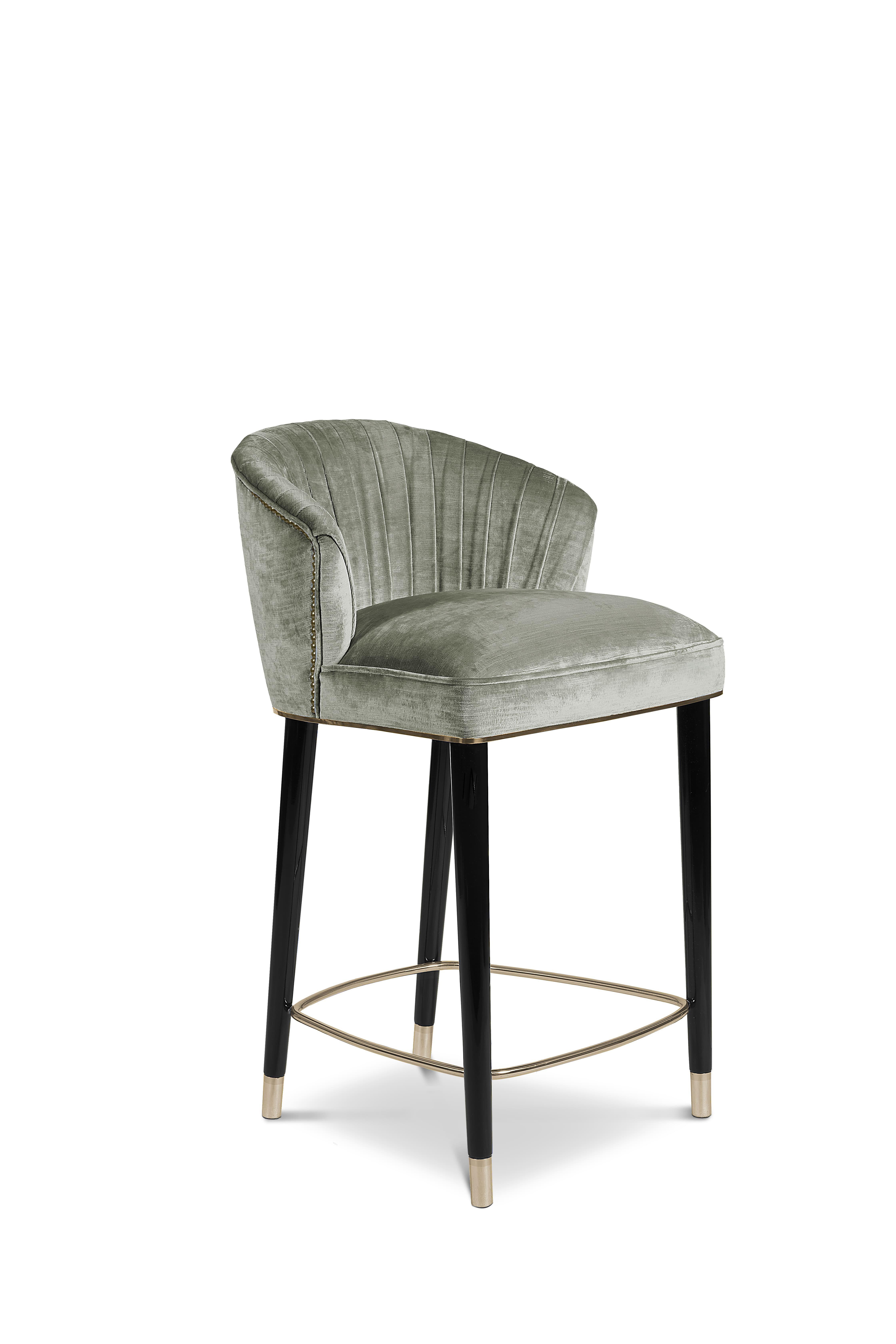 Nuka is a glacier in Alaska known for its sublime beauty. NUKA Counter Stool came to life inspired by this magnificent natural monument. Upholstered in velvet and legs in glossy black lacquered, this occasional chair with a curved back will make any